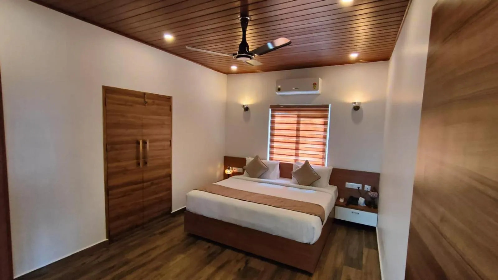 air conditioner, Bed in Ramee Wolkenburg Resort & Spa, Munnar