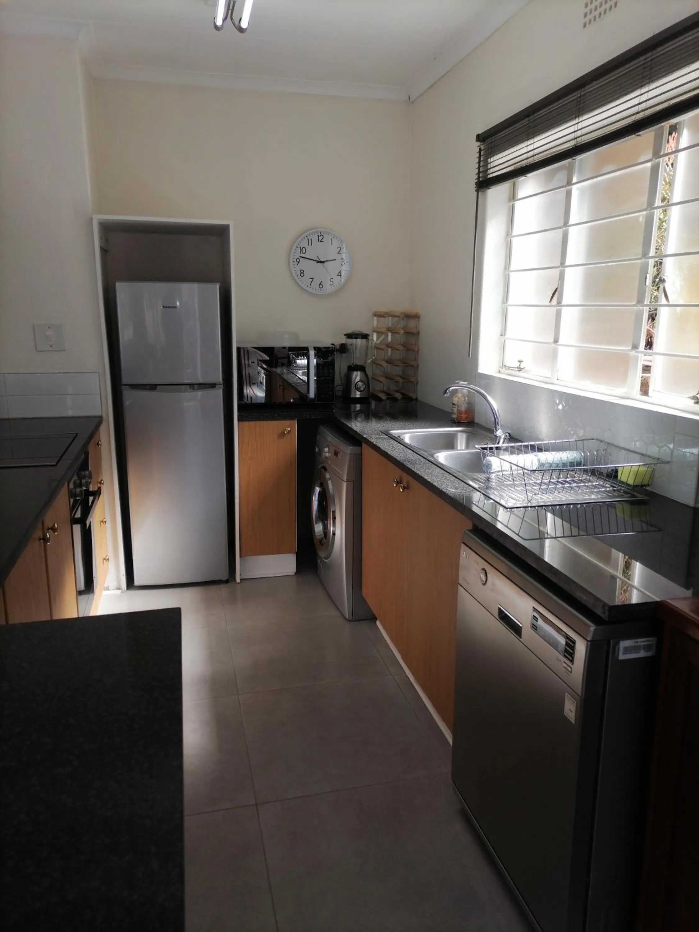 Kitchen or kitchenette in CityView, a stunning modern apartment