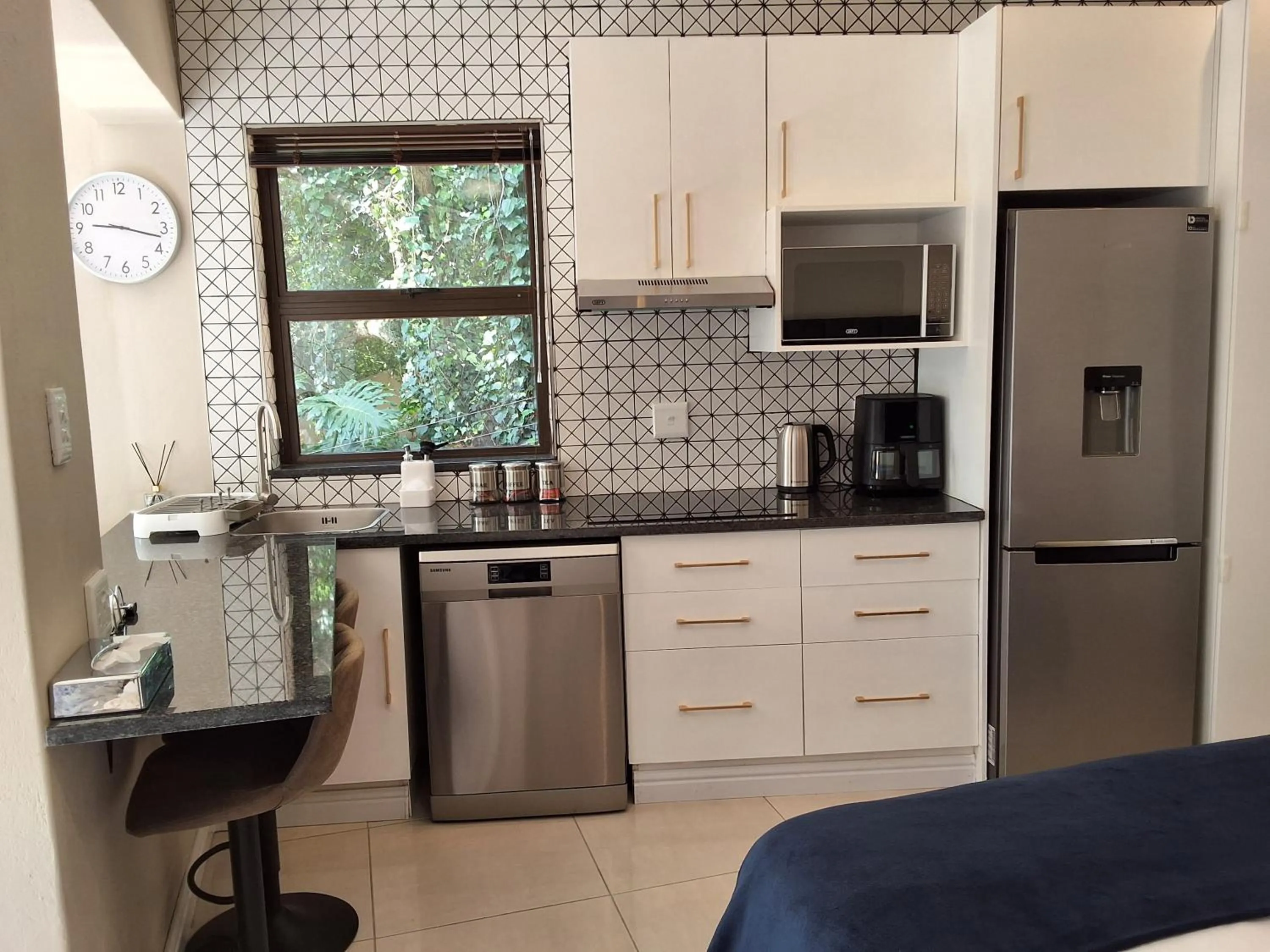 Coffee/tea facilities in CityView, a stunning modern apartment