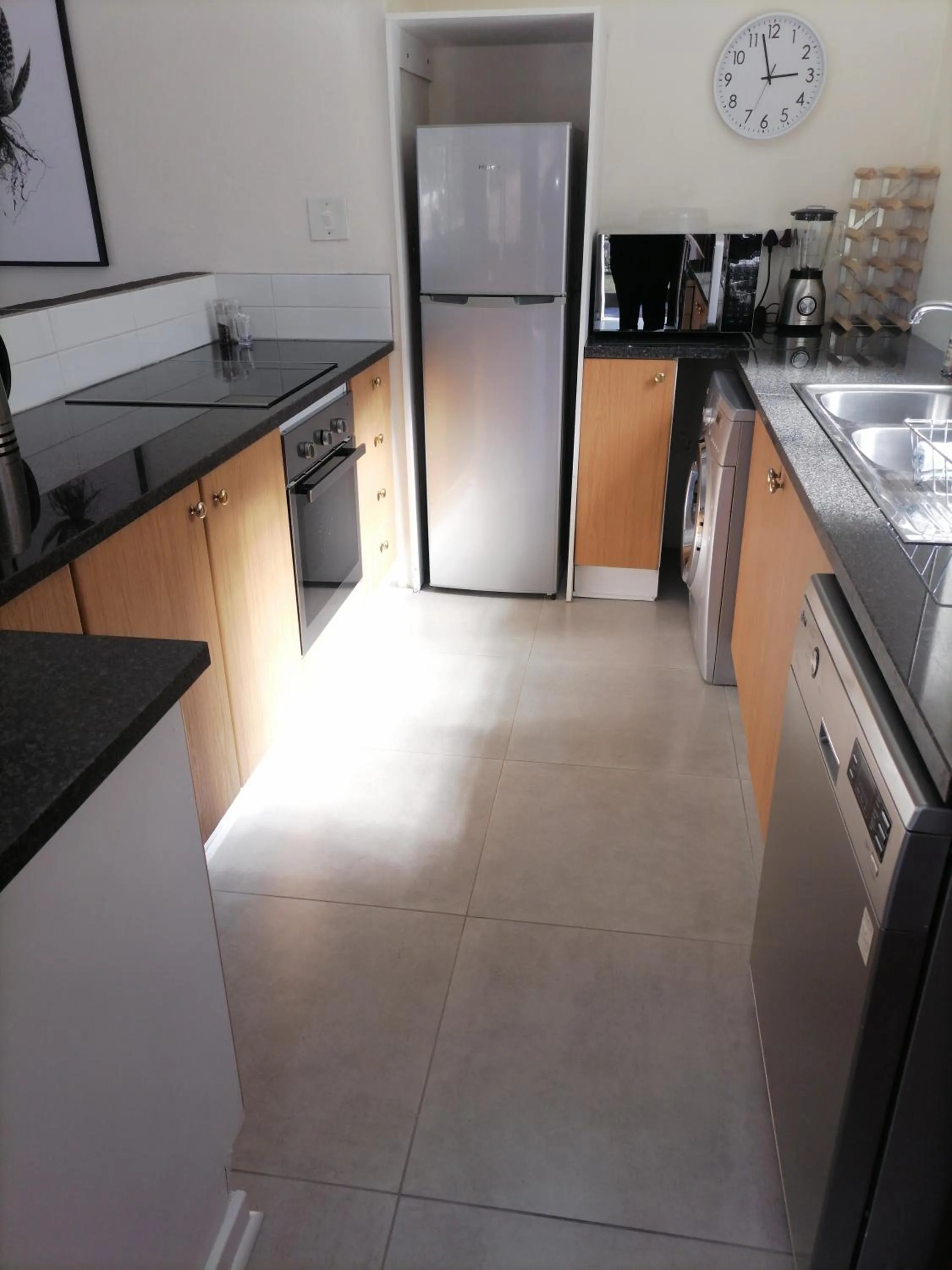 Kitchen or kitchenette in CityView, a stunning modern apartment