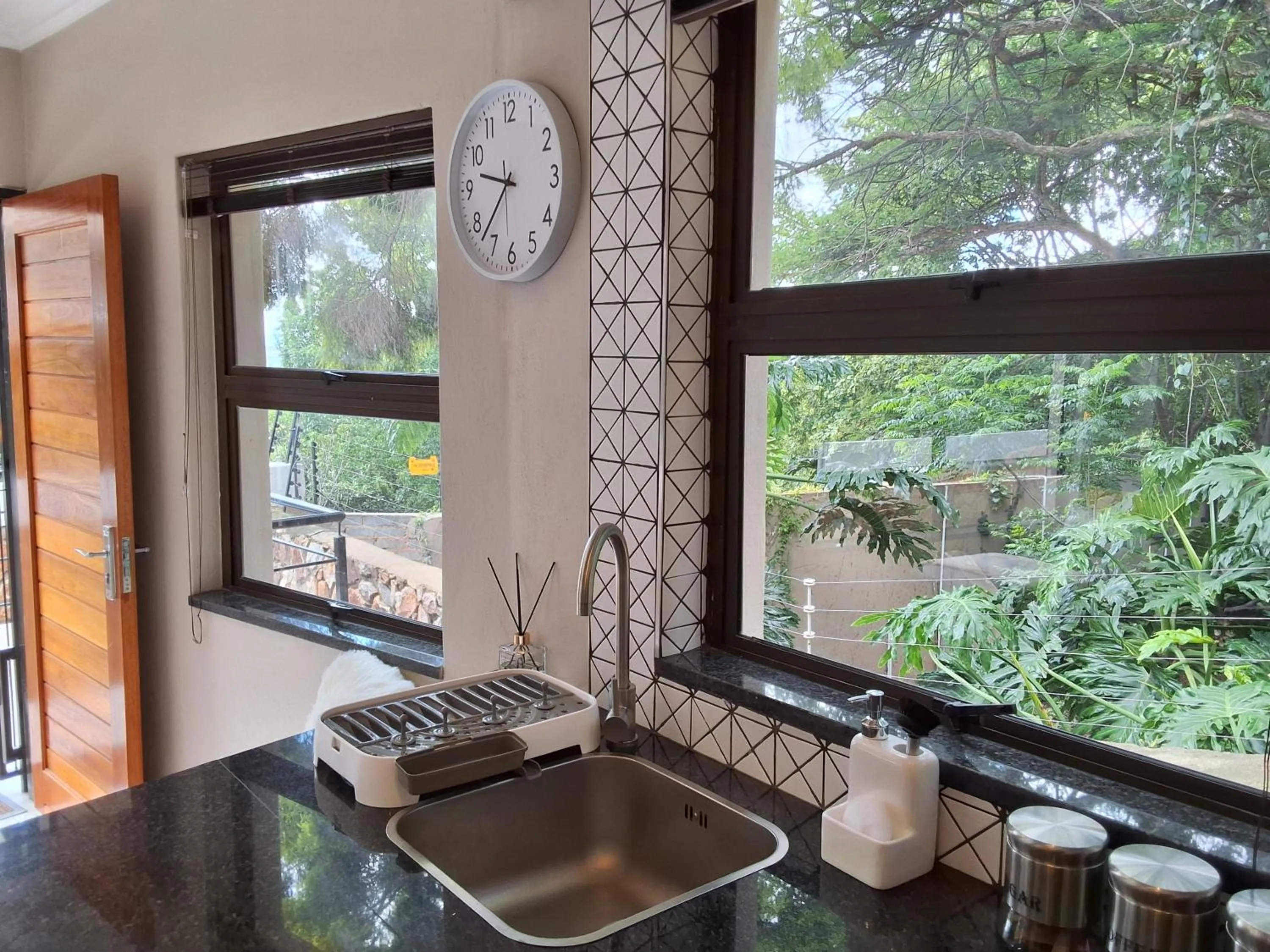 Kitchen or kitchenette in CityView, a stunning modern apartment