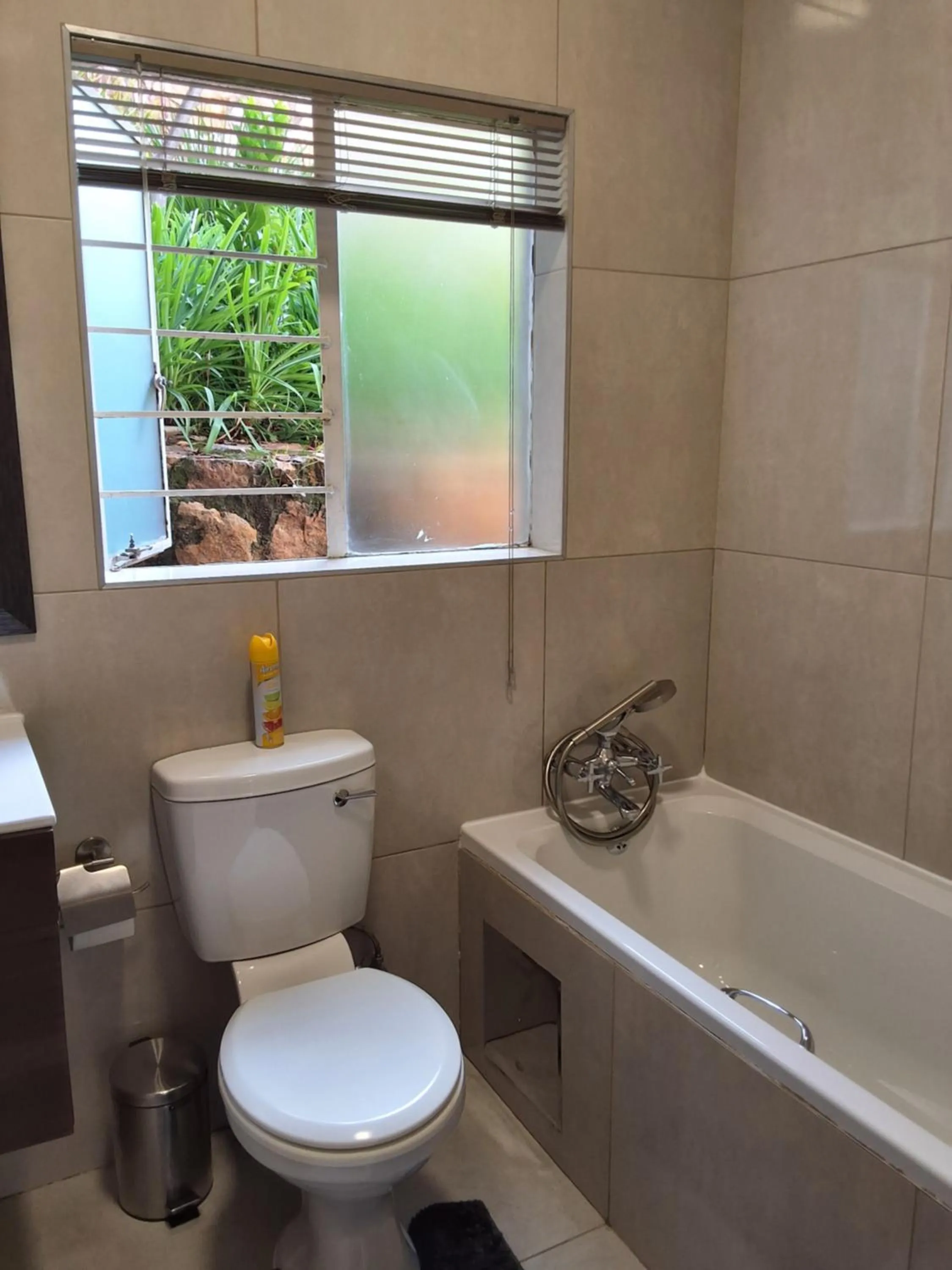 Bathroom in CityView, a stunning modern apartment