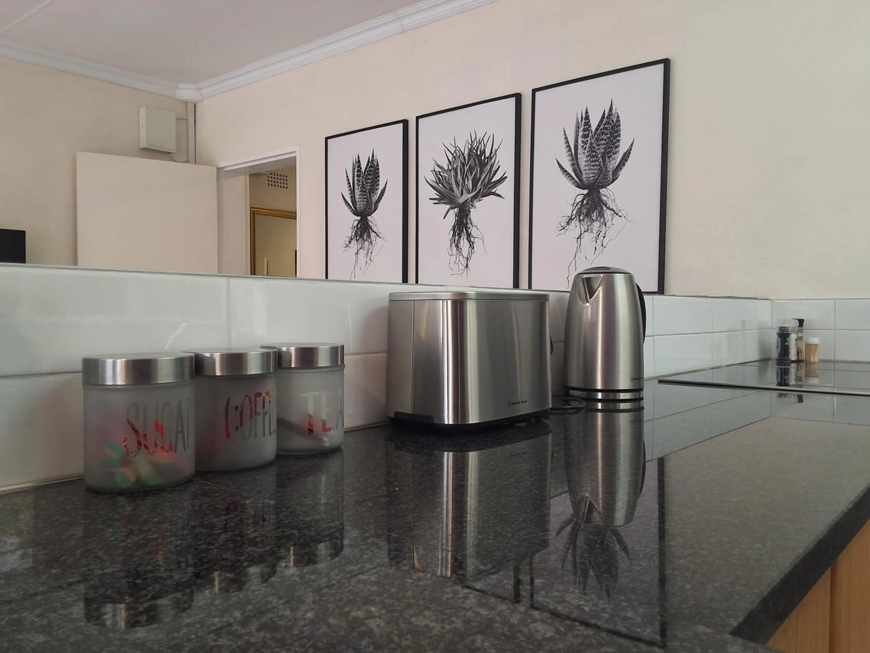 Kitchen or kitchenette in CityView, a stunning modern apartment