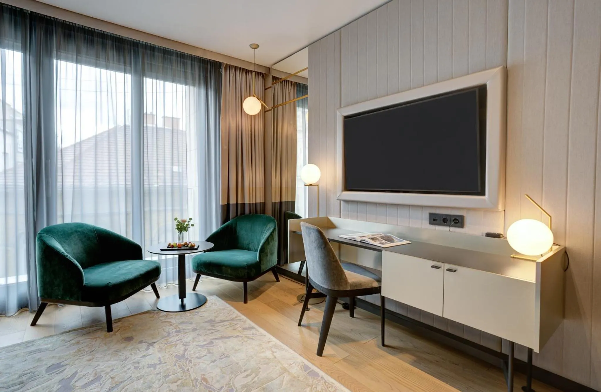 Bedroom in Emerald Downtown Luxury Suites by Continental Group