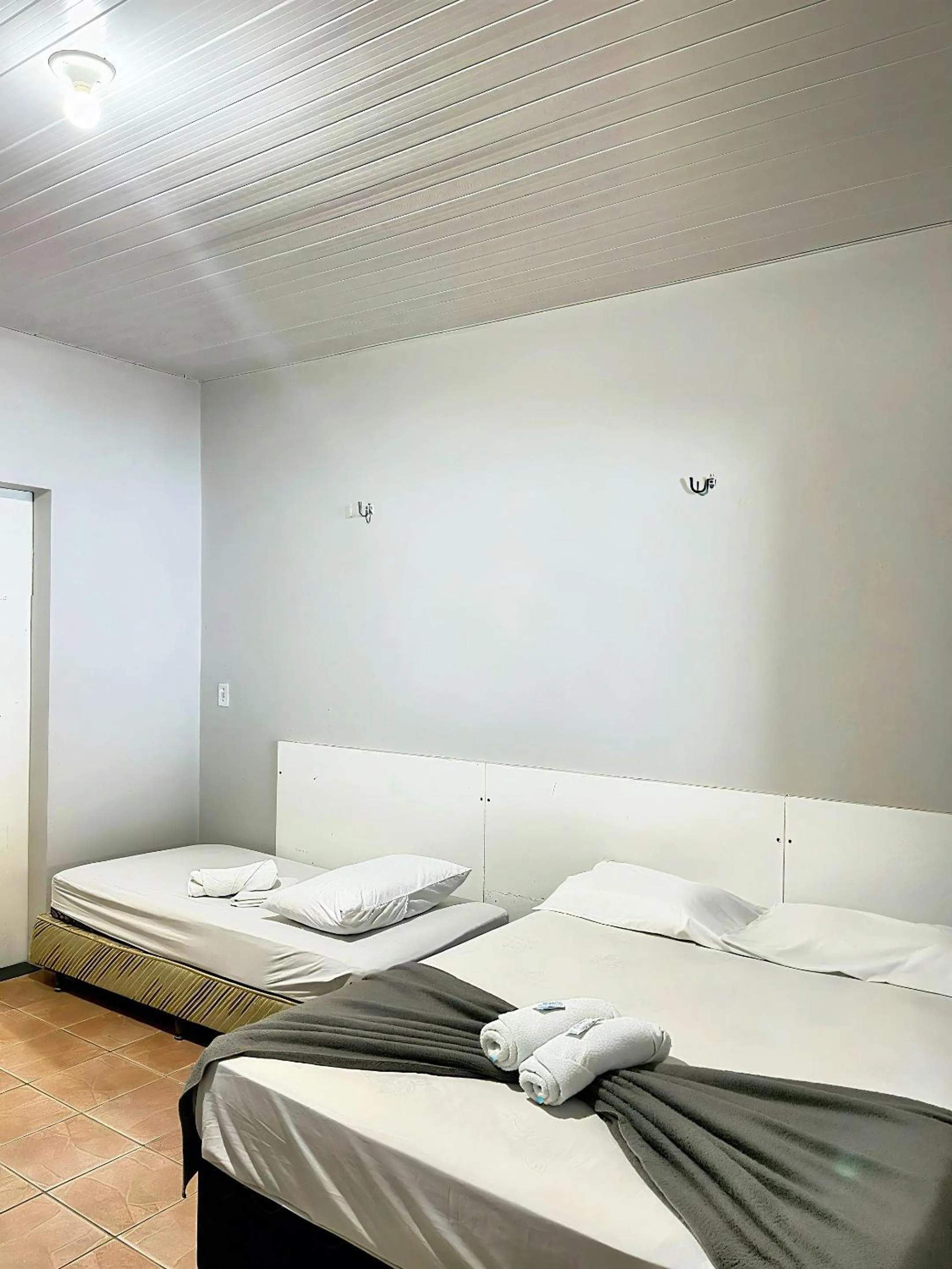 Bed in Pousada Cristo Rei-Parnaíba 24h