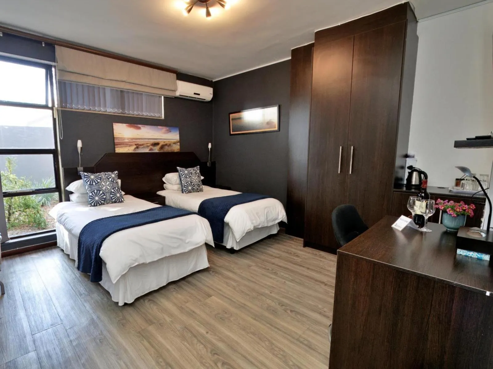Photo of the whole room, Bed in Beachwood Inn Melkbosstrand