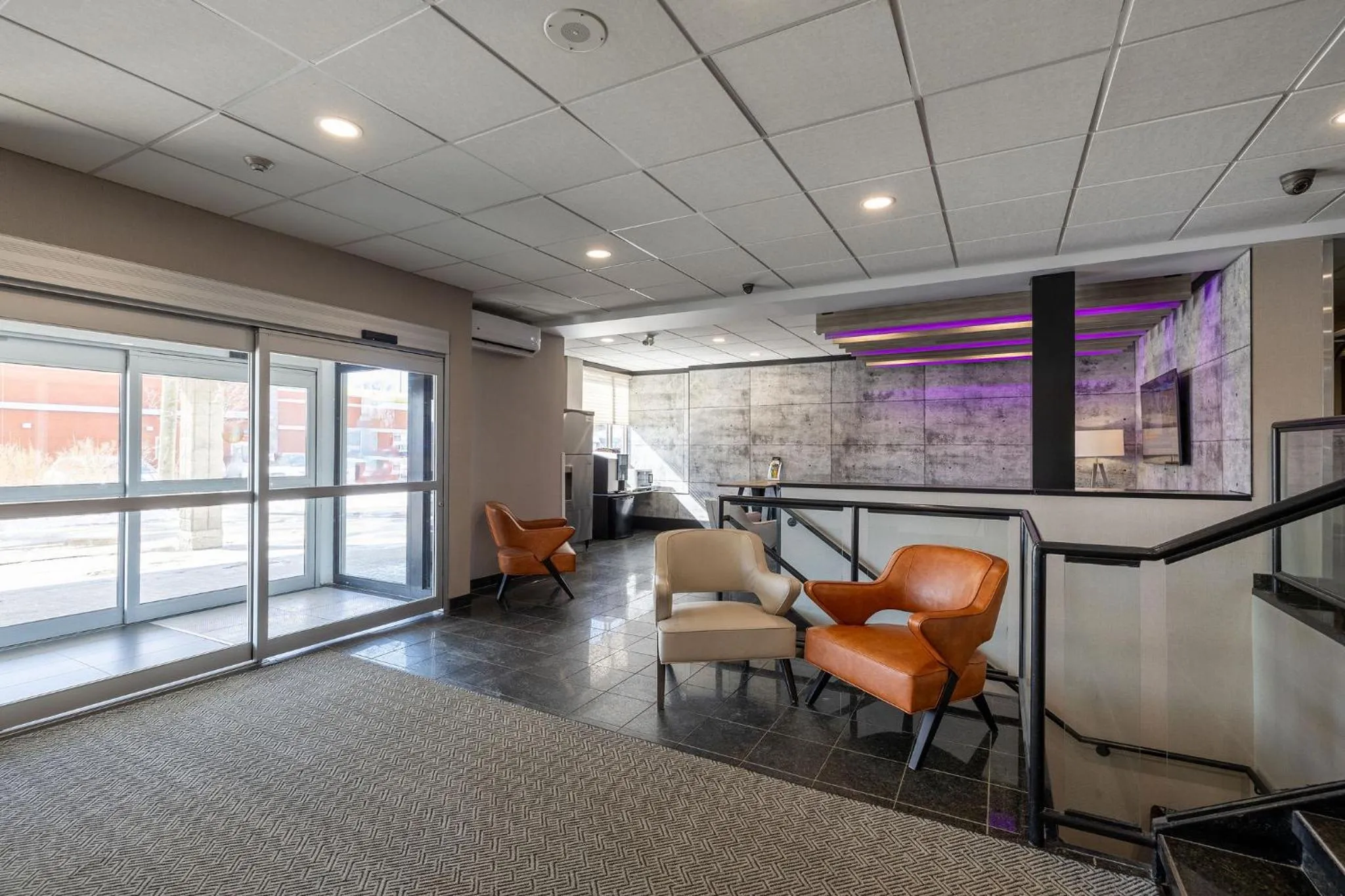 Lobby or reception in Repotel Aéroport Québec