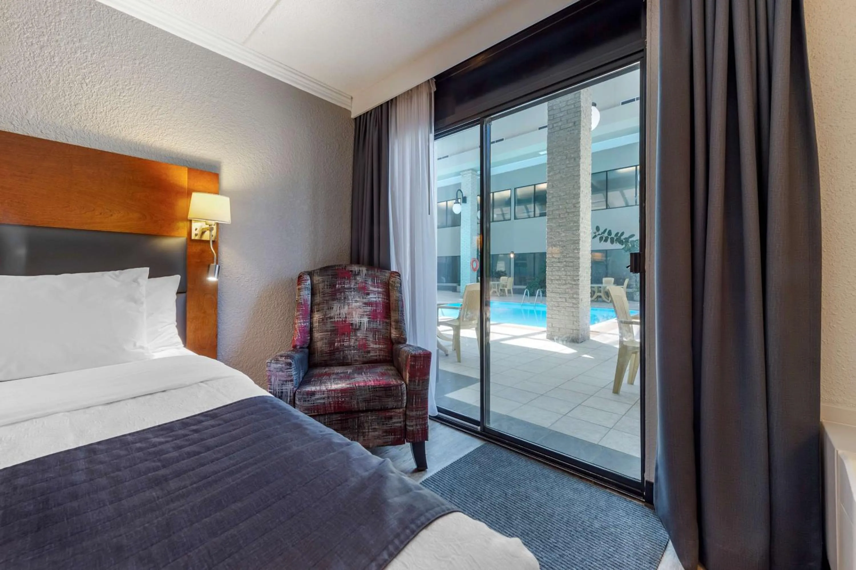 Queen Room with Two Queen Beds and Pool Access - Non-Smoking in Best Western Hotel Universel Drummondville