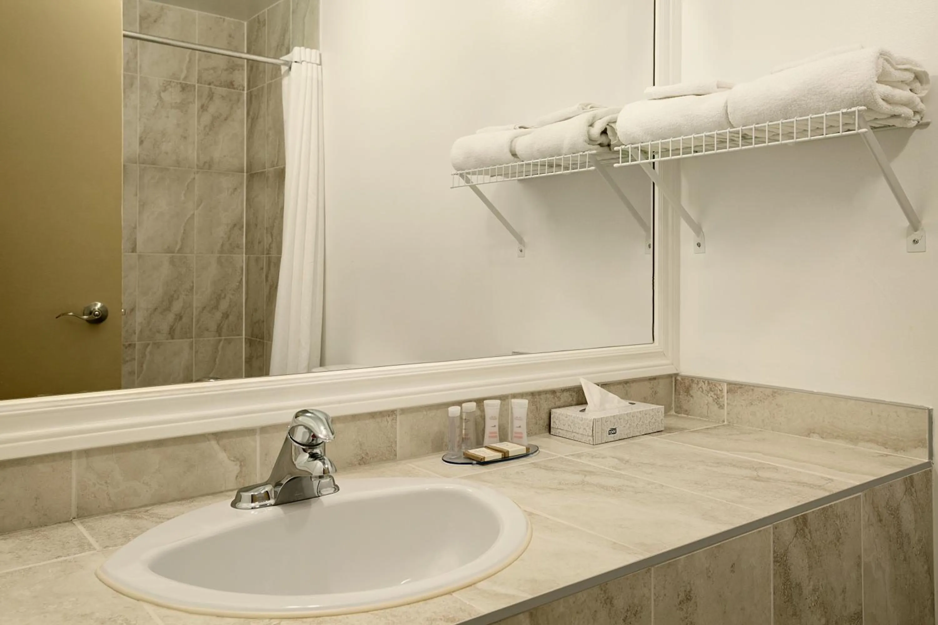 Bathroom in Days Inn by Wyndham Montreal East