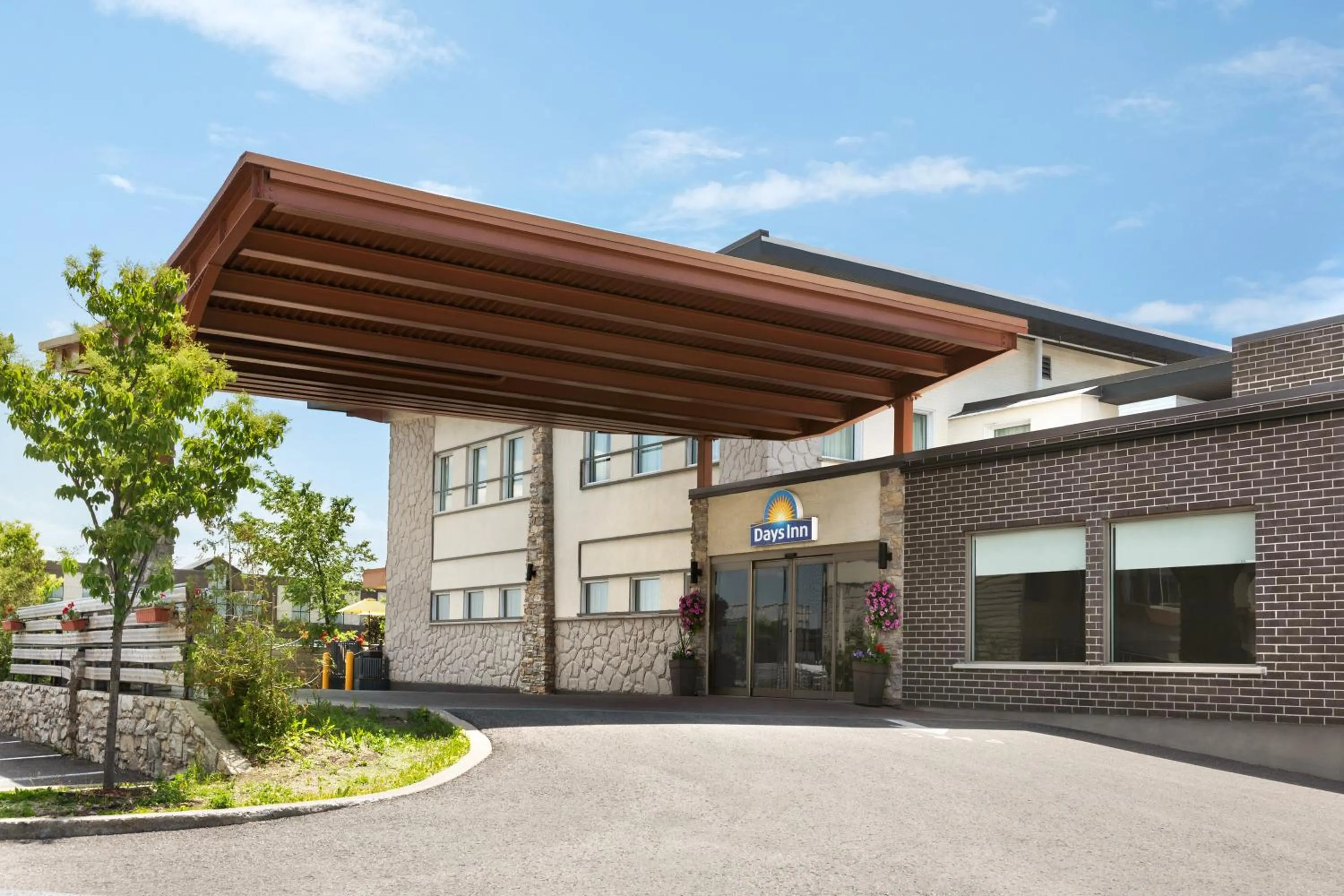 Property building in Days Inn by Wyndham Montreal East