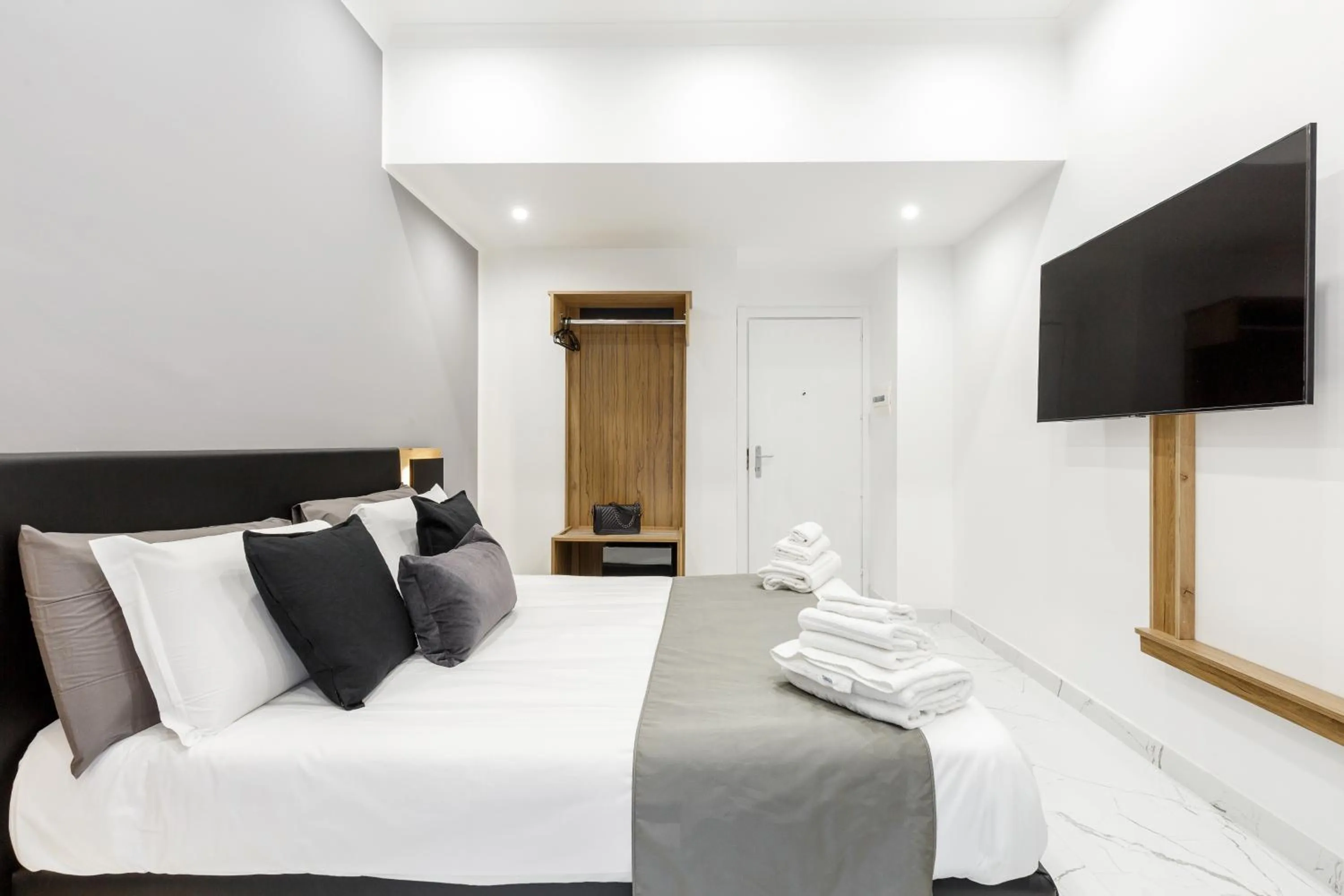 Bed in Sant'Angelo Suites