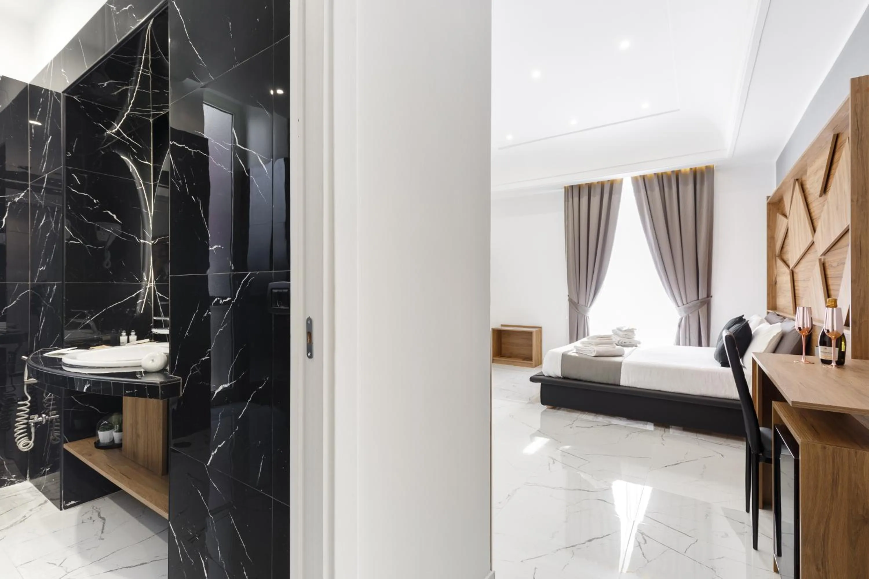 Bed in Sant'Angelo Suites