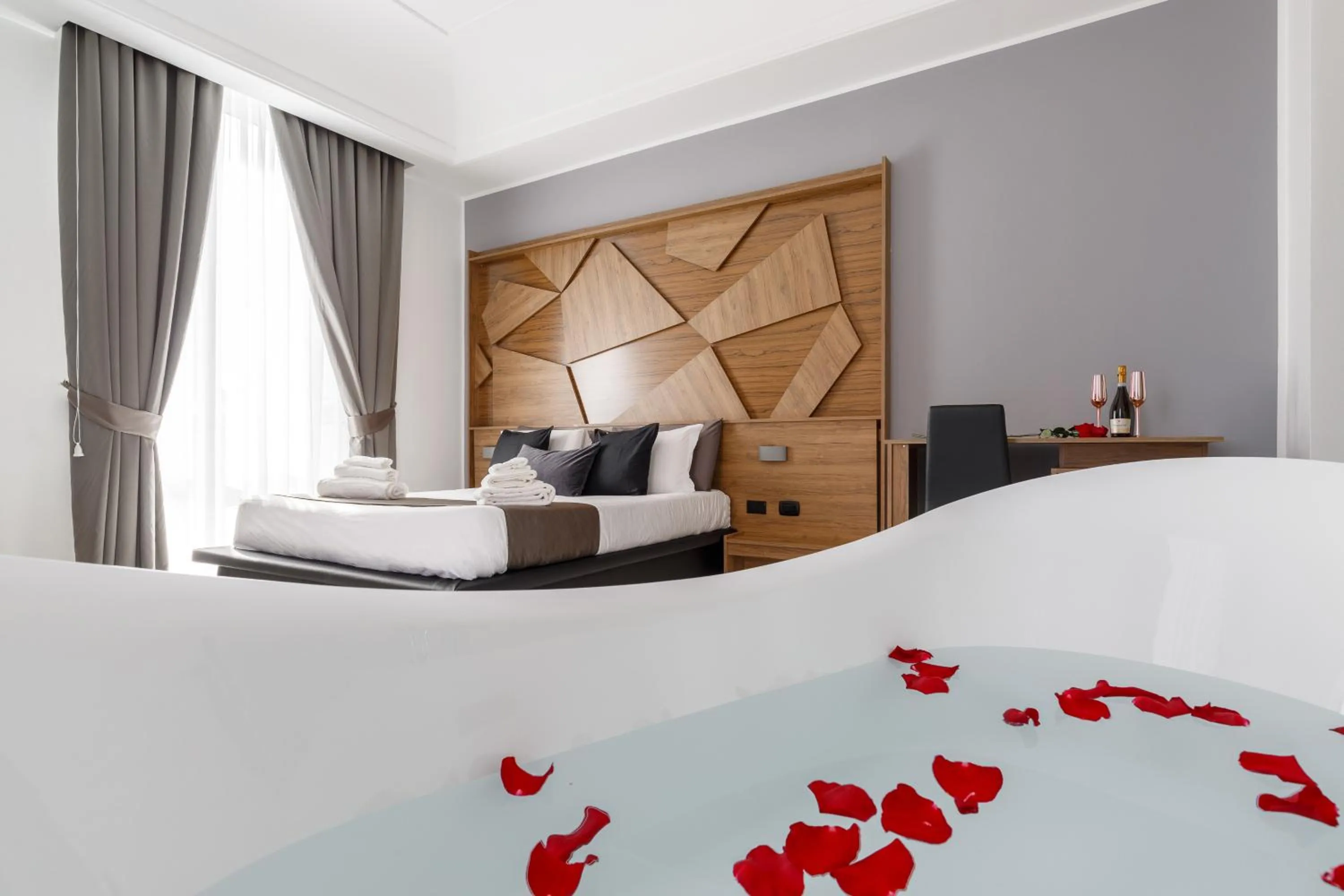 Bed in Sant'Angelo Suites