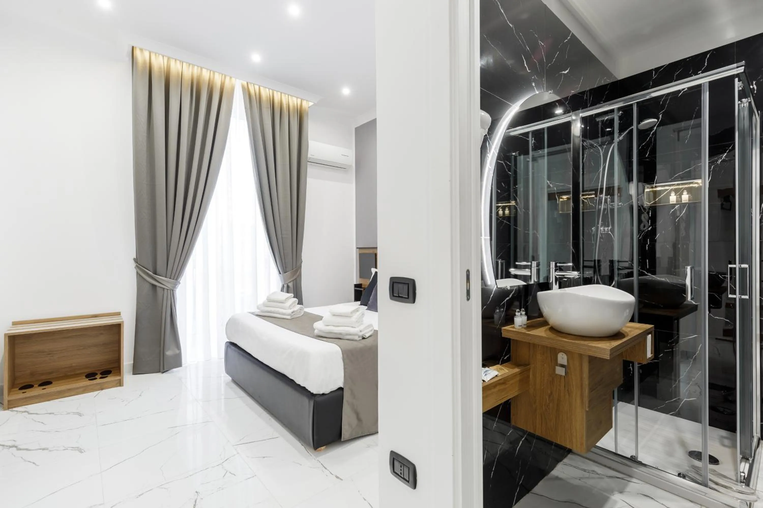 Bed in Sant'Angelo Suites