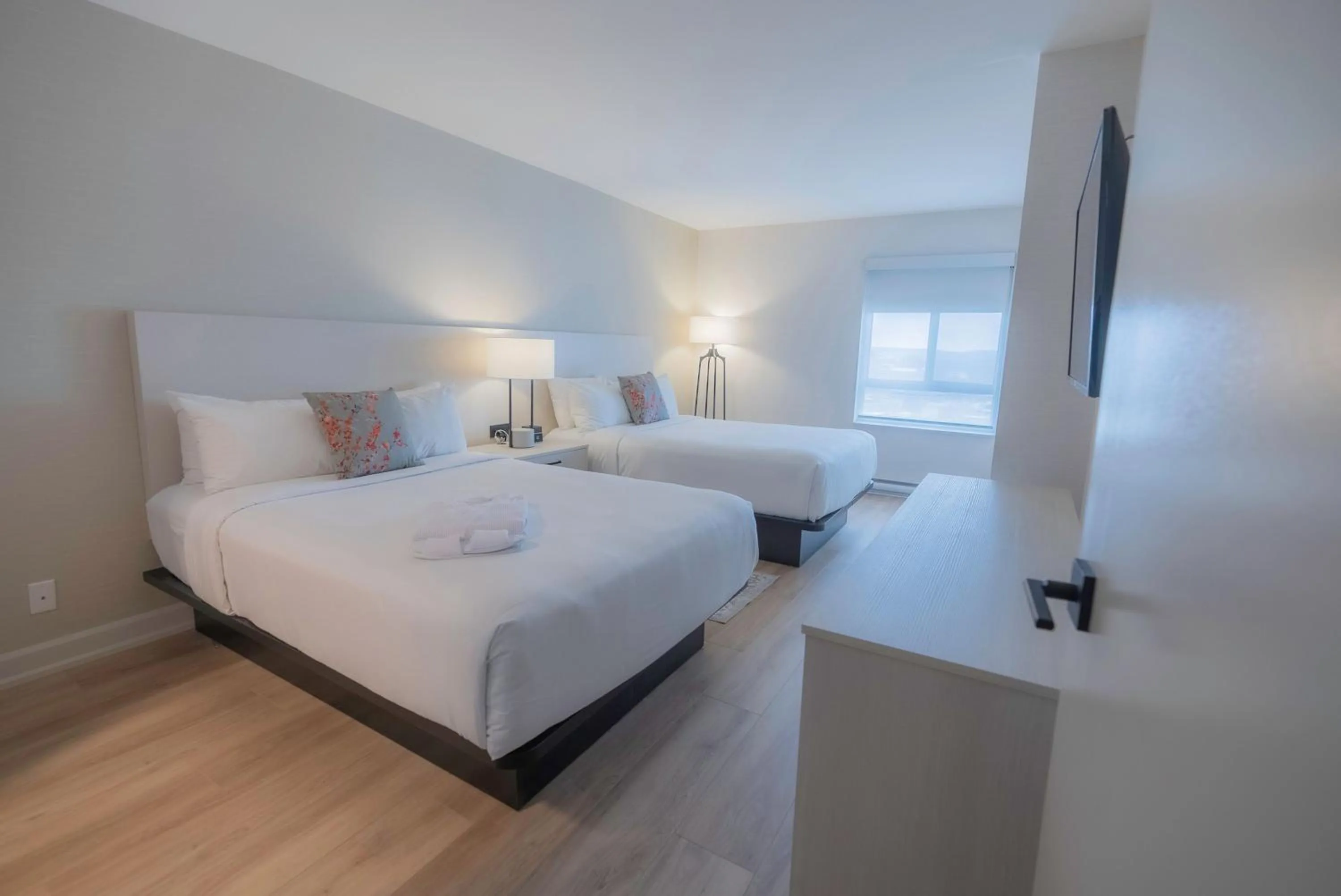 Bed in Les Suites Hotel Ottawa