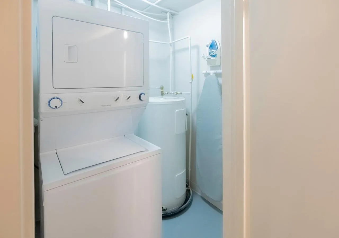 washing machine in Les Suites Hotel Ottawa