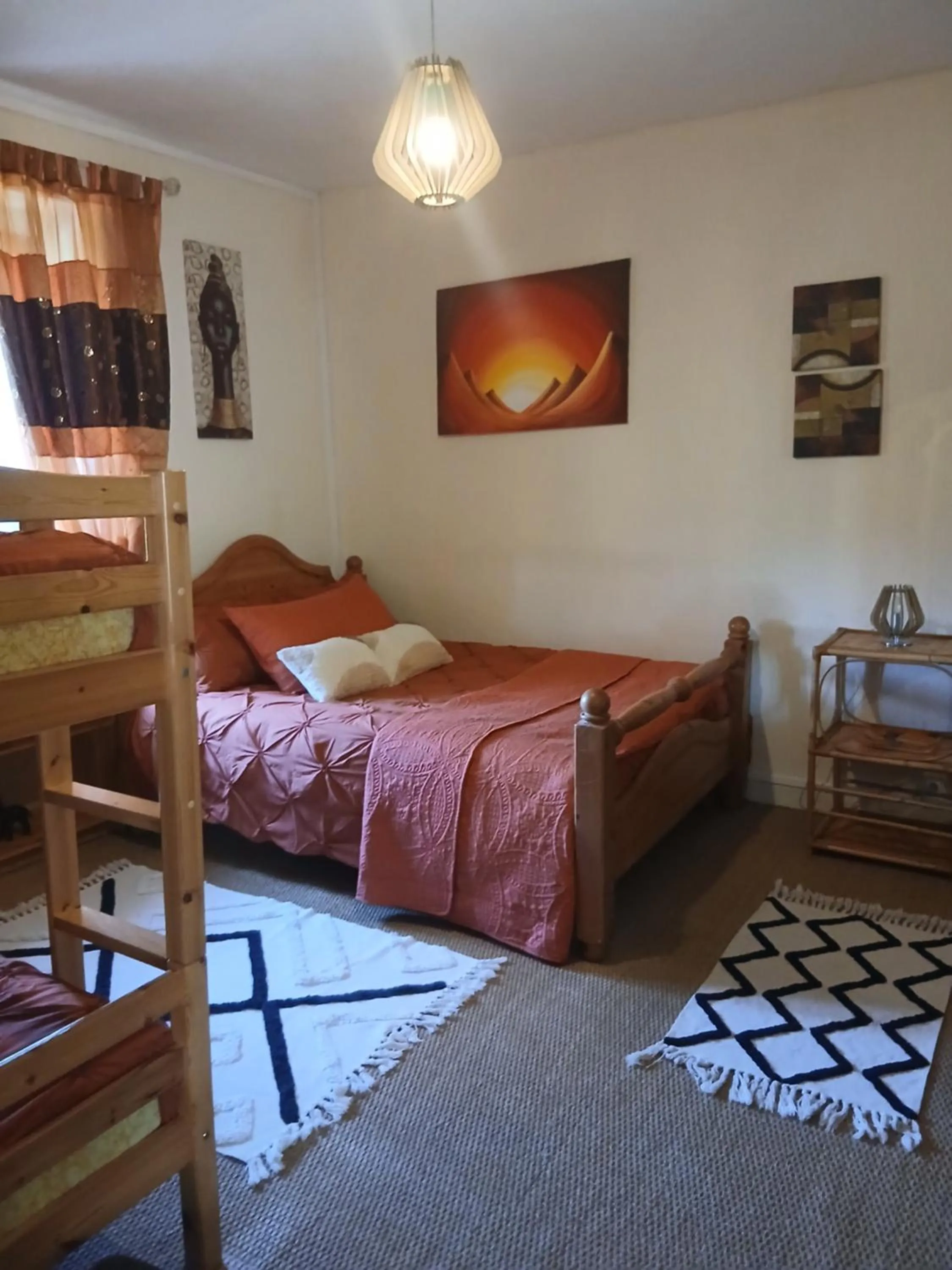 Bed in Sunset House Chambres de Hotes