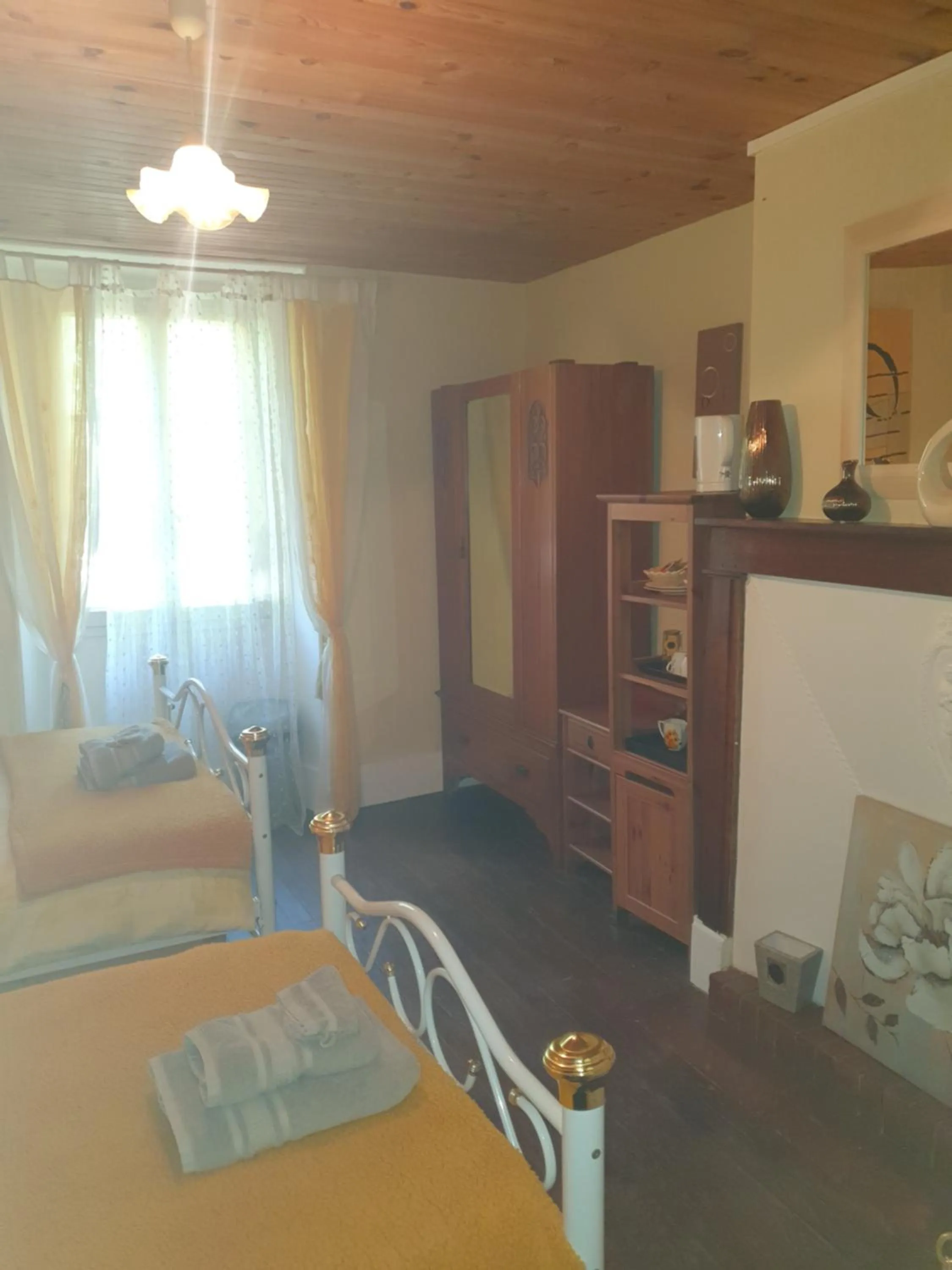 Bed in Sunset House Chambres de Hotes