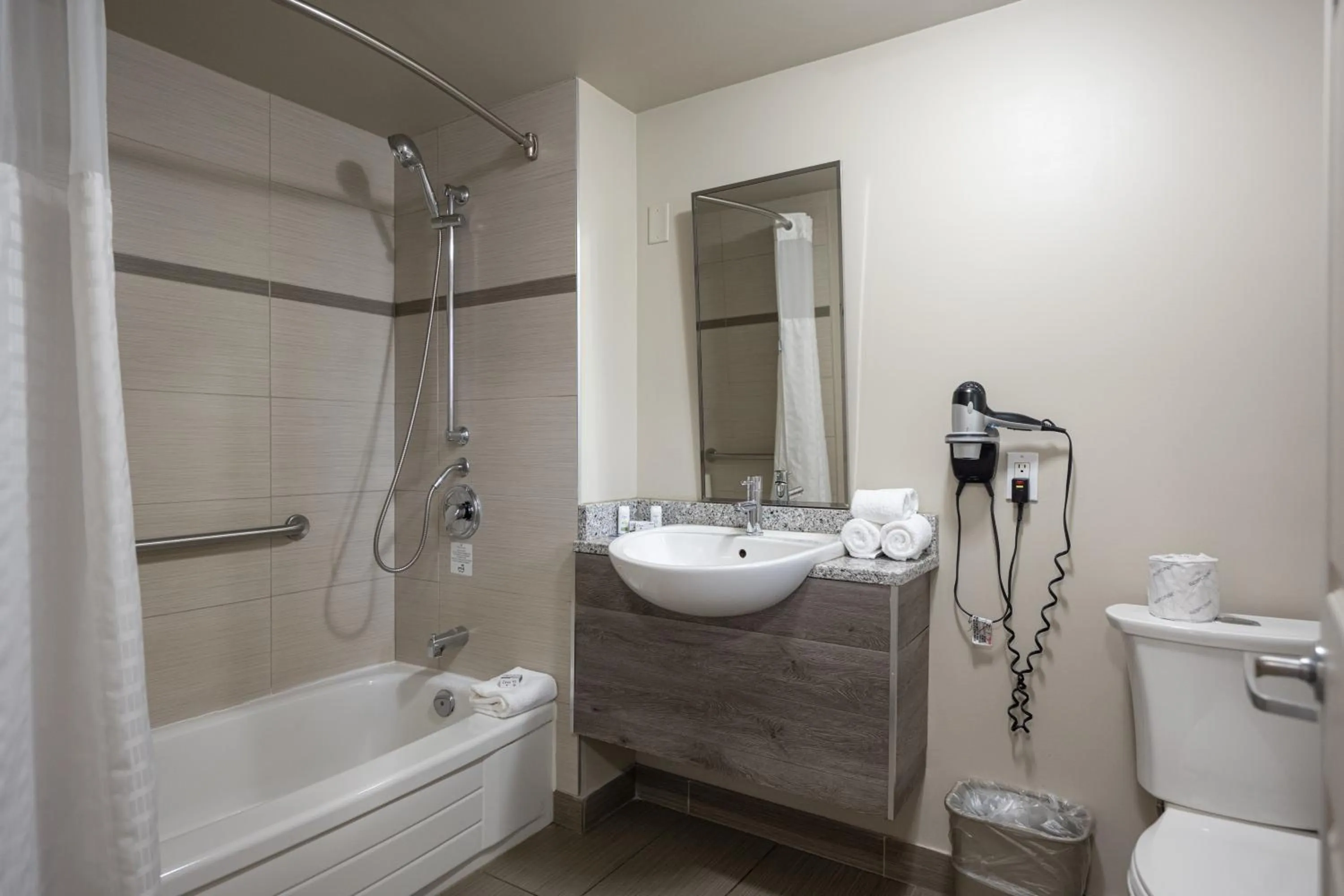 Bathroom in Ramada by Wyndham Ottawa On The Rideau