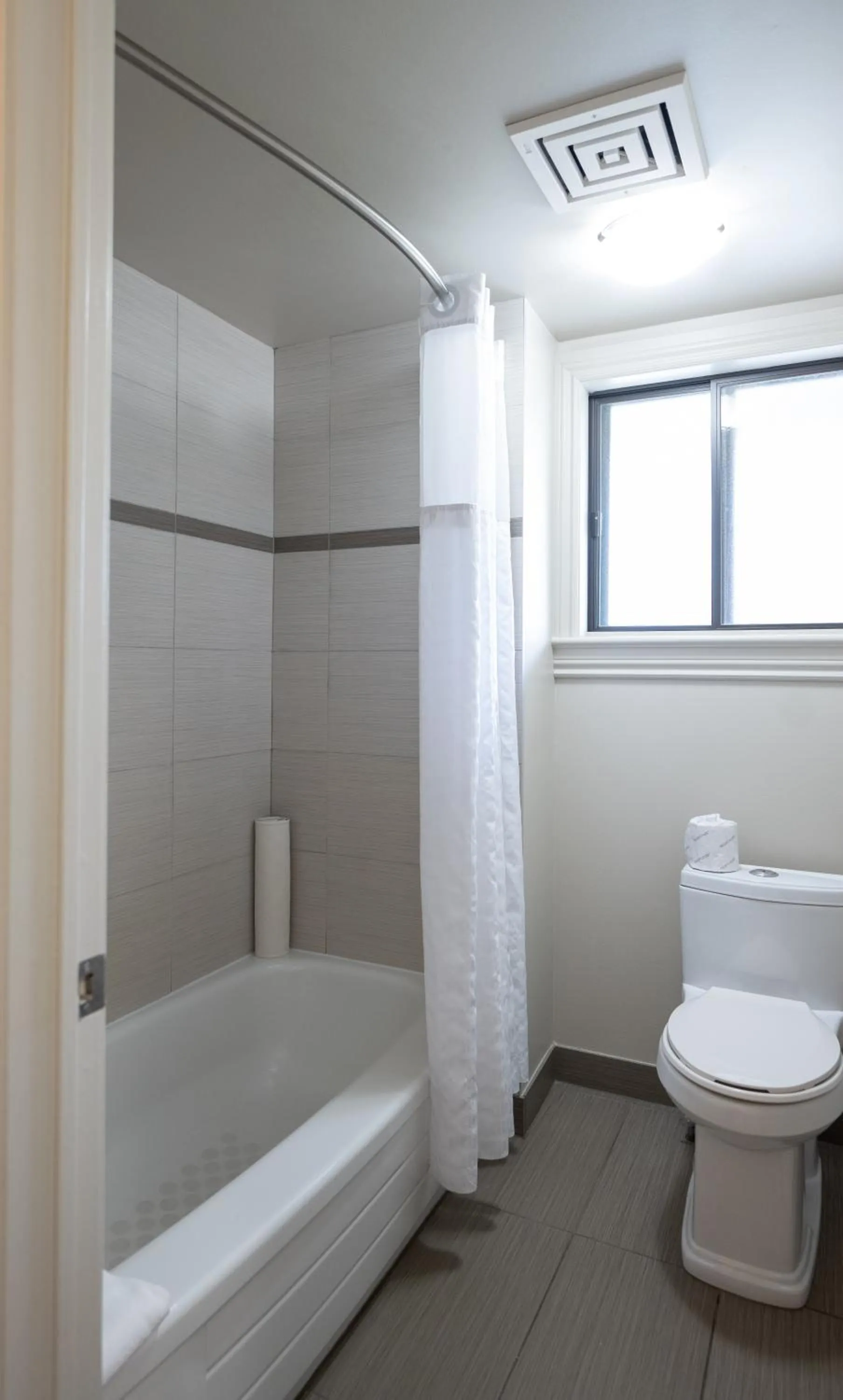 Bathroom in Ramada by Wyndham Ottawa On The Rideau