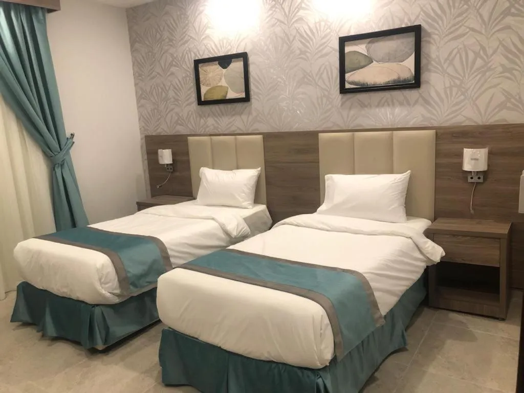 Bed in Al-Haramain Family Apartments