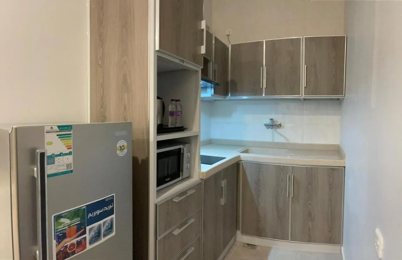 Kitchen or kitchenette in Al-Haramain Family Apartments