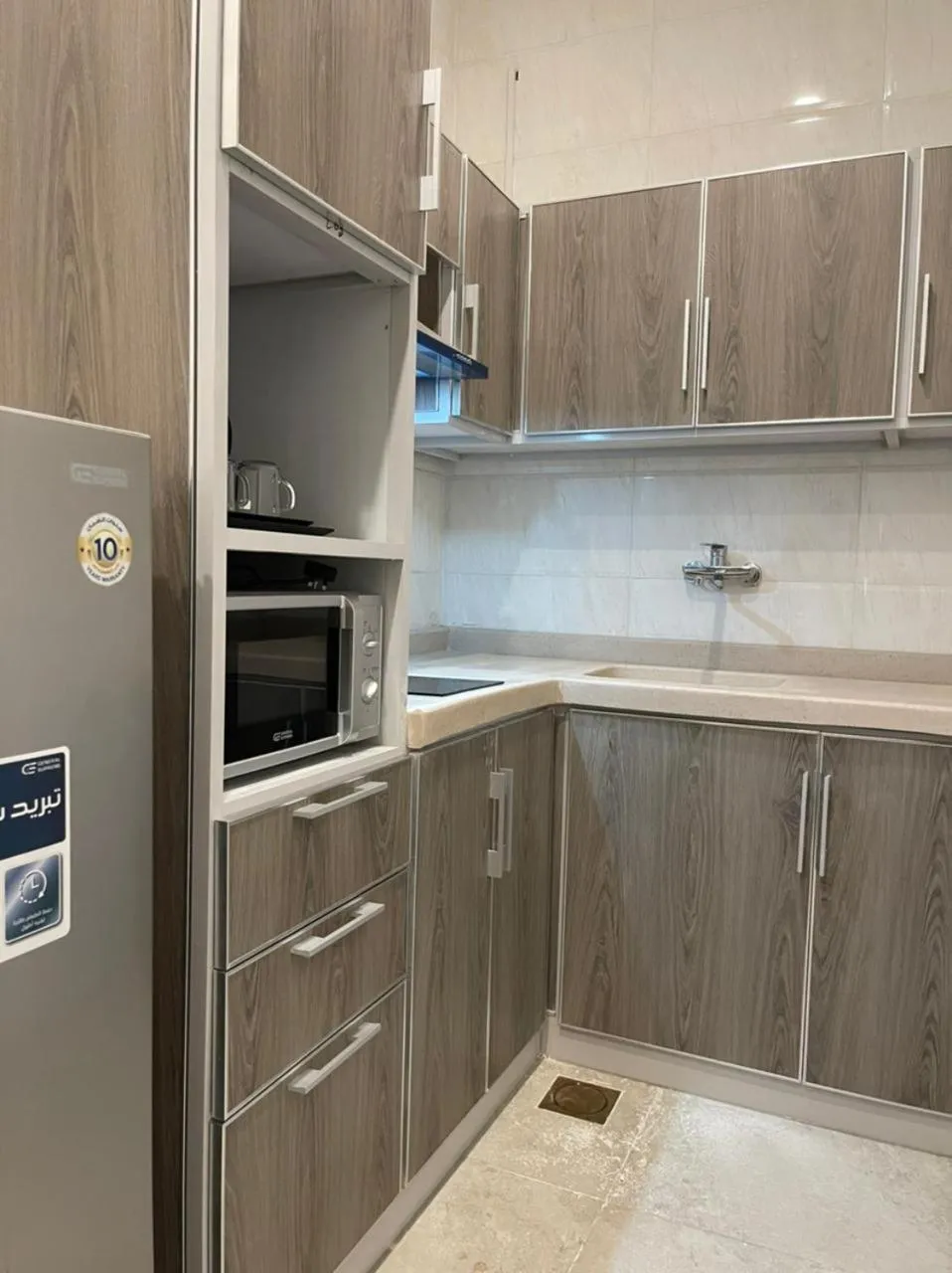 Kitchen or kitchenette in Al-Haramain Family Apartments