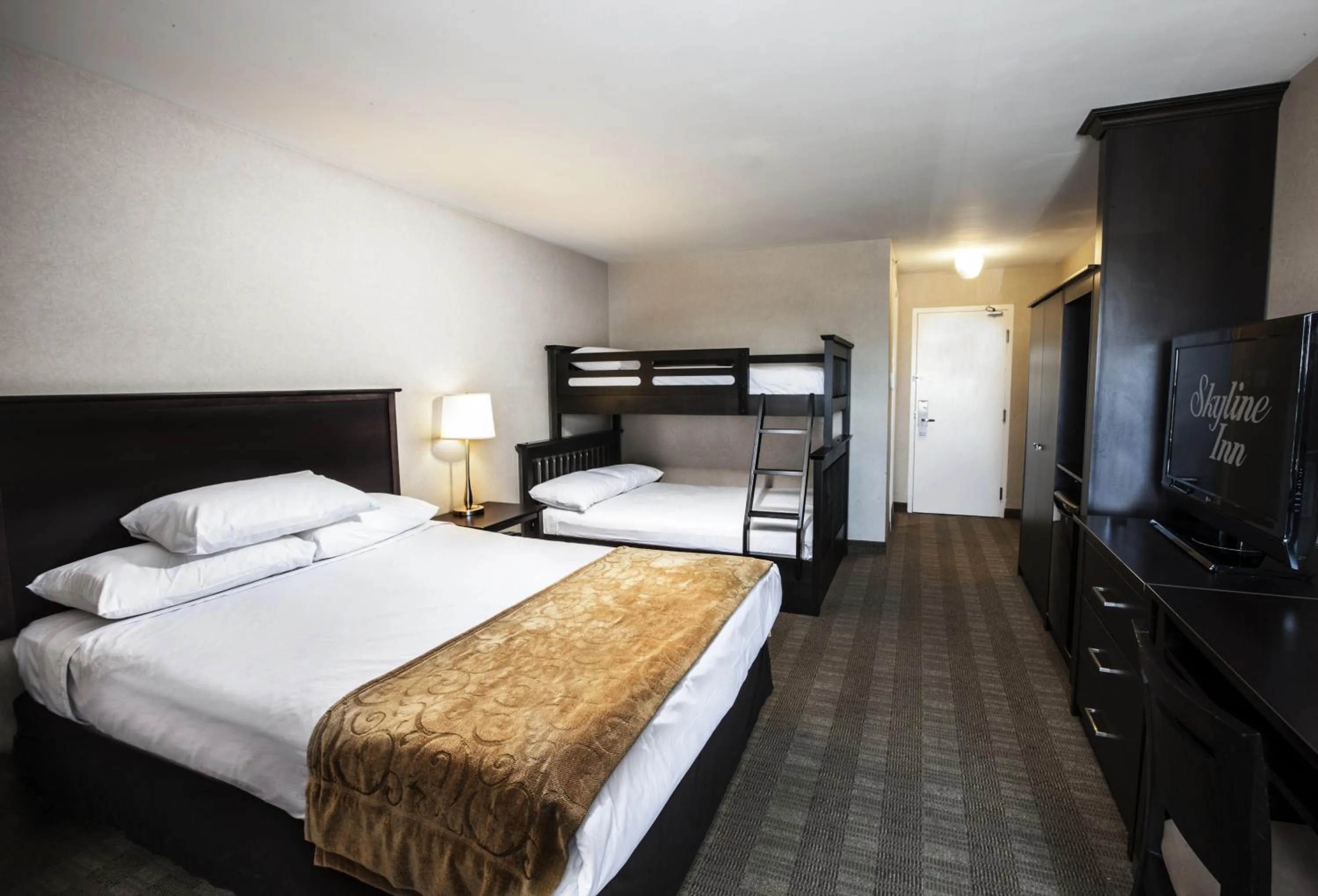 Photo of the whole room, Bed in Skyline Hotel & Waterpark