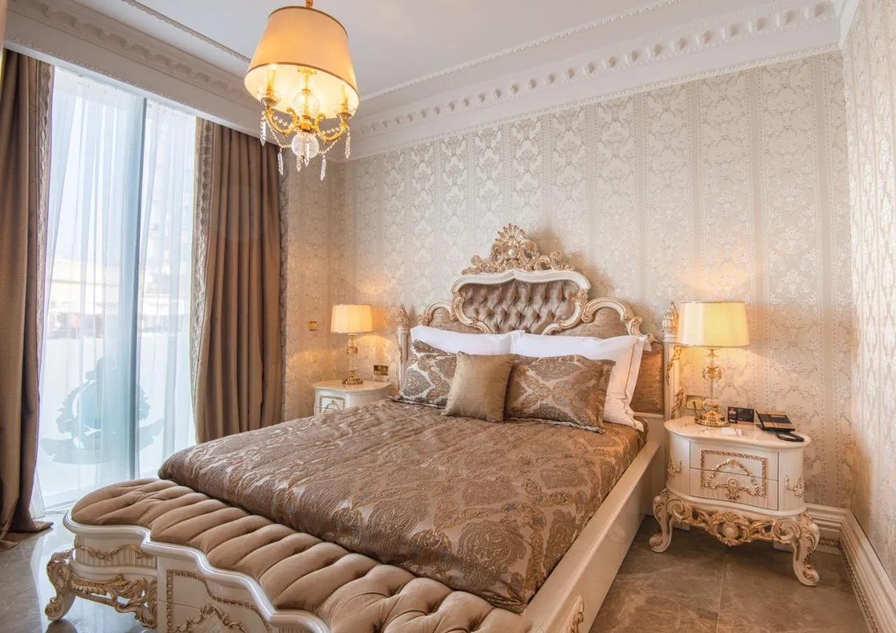 Photo of the whole room, Bed in Les Ambassadeurs Hotel Casino&Marina