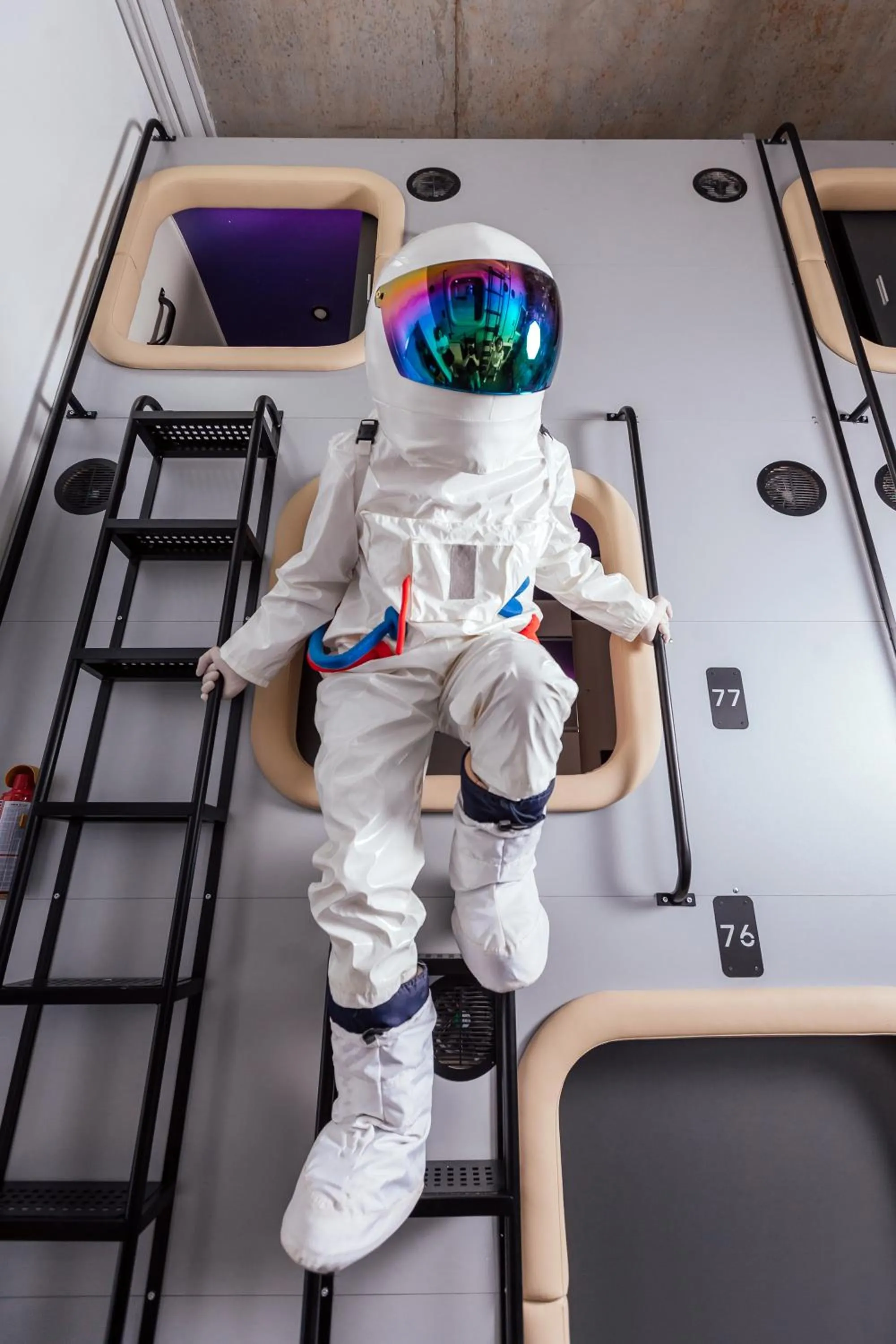 People in Capsule Hotel Constellation 89