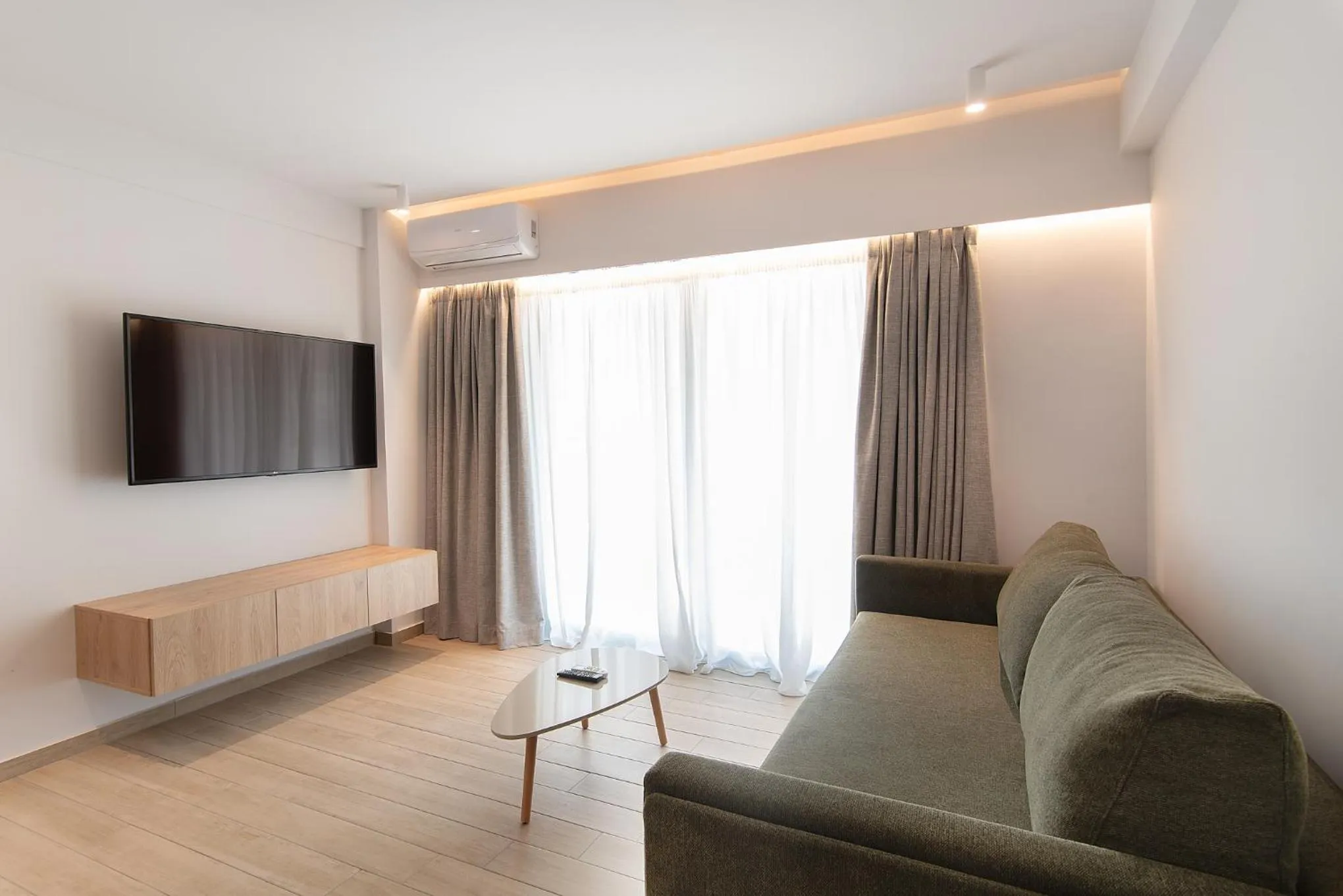 Living room, Bed in The Residences Kalamata