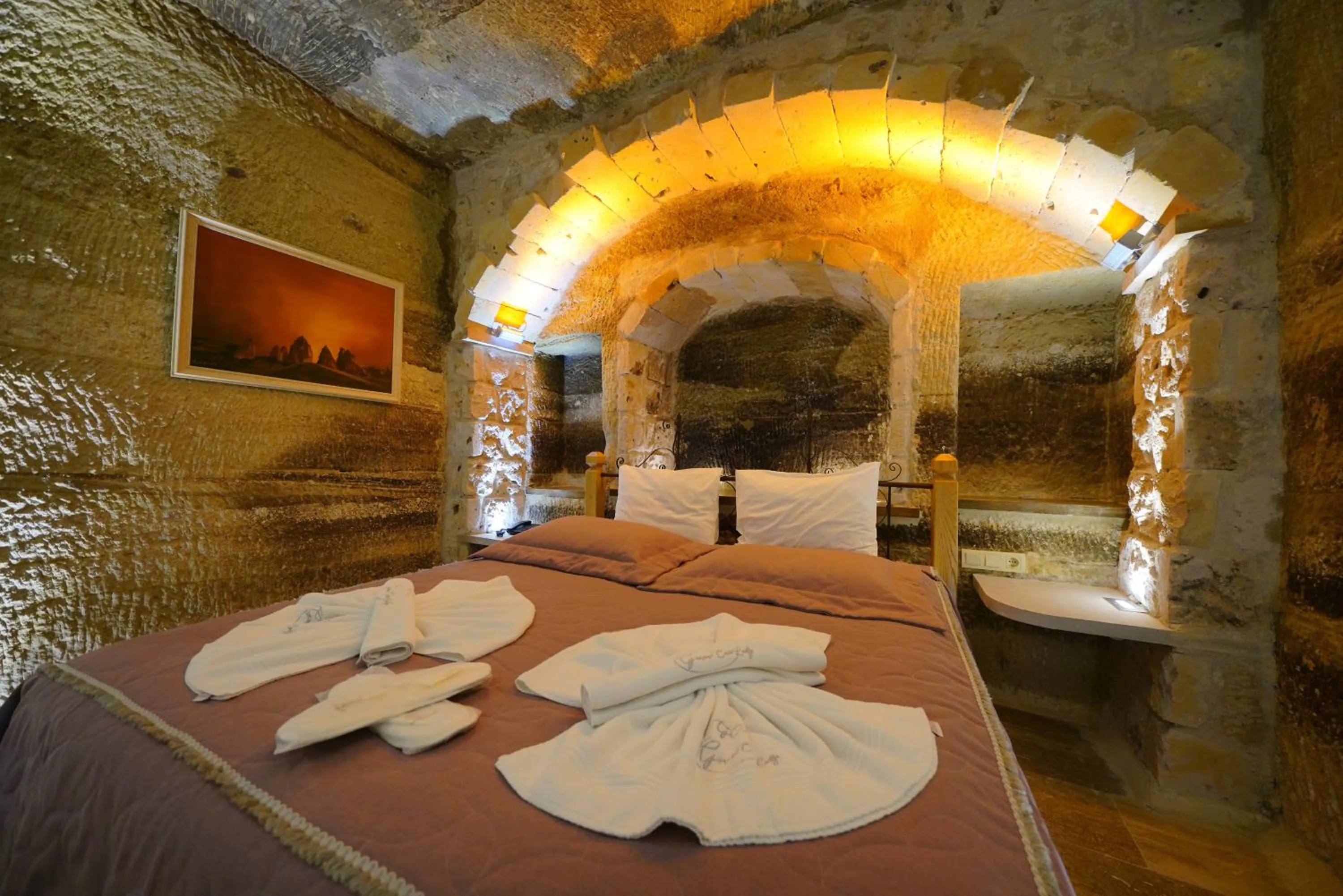 Bed in Göreme Cave Lodge