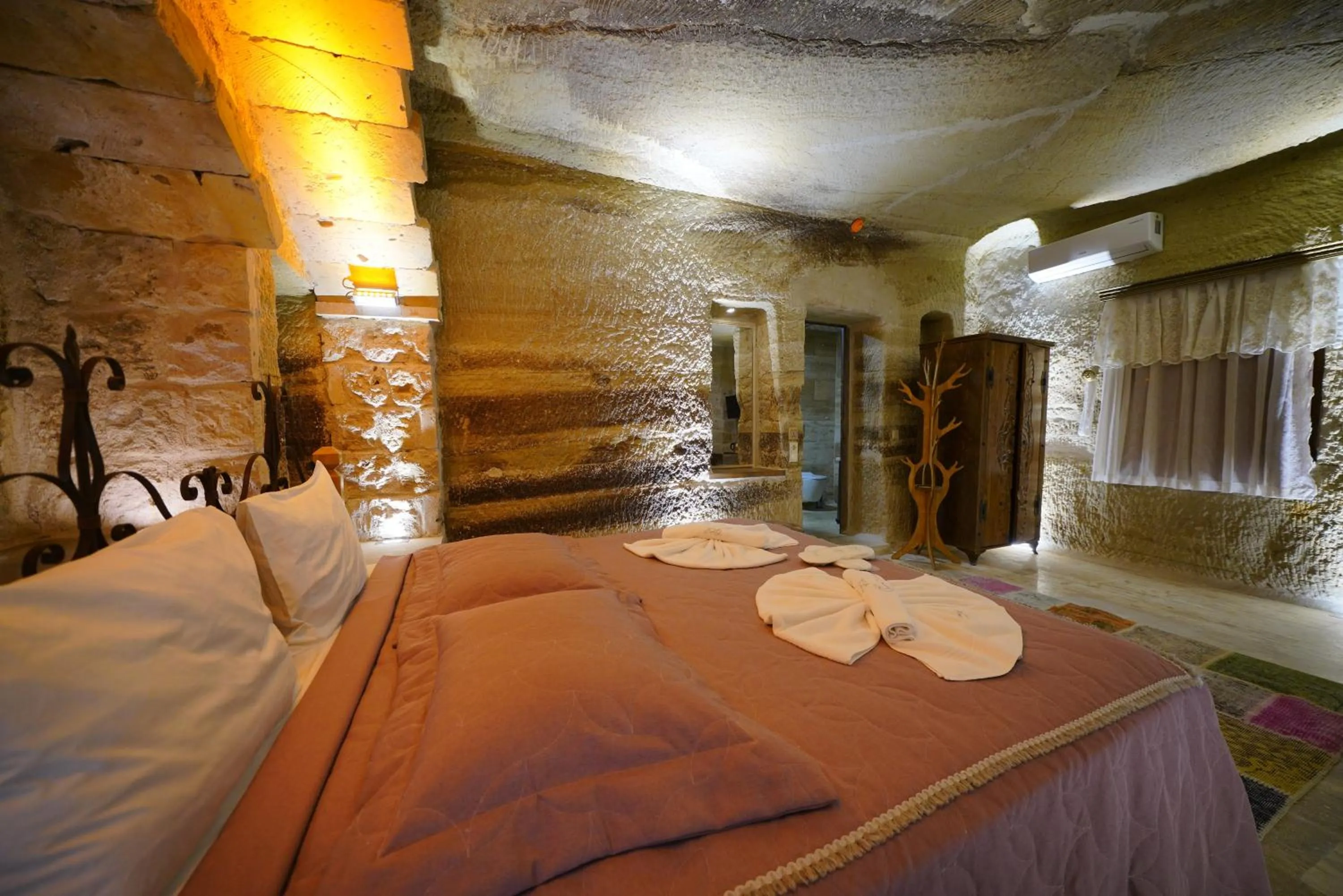 Bed in Göreme Cave Lodge