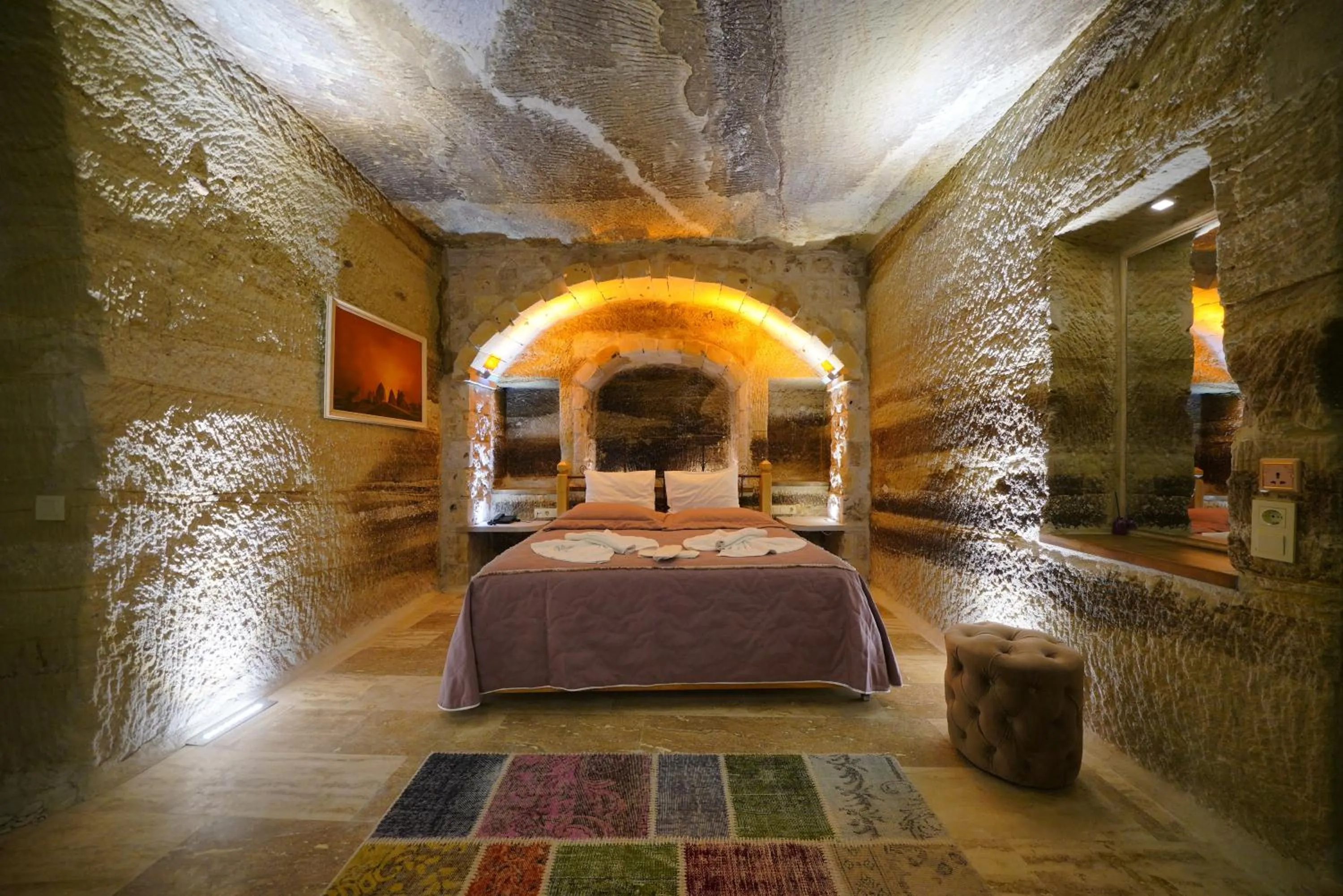 Bed in Göreme Cave Lodge