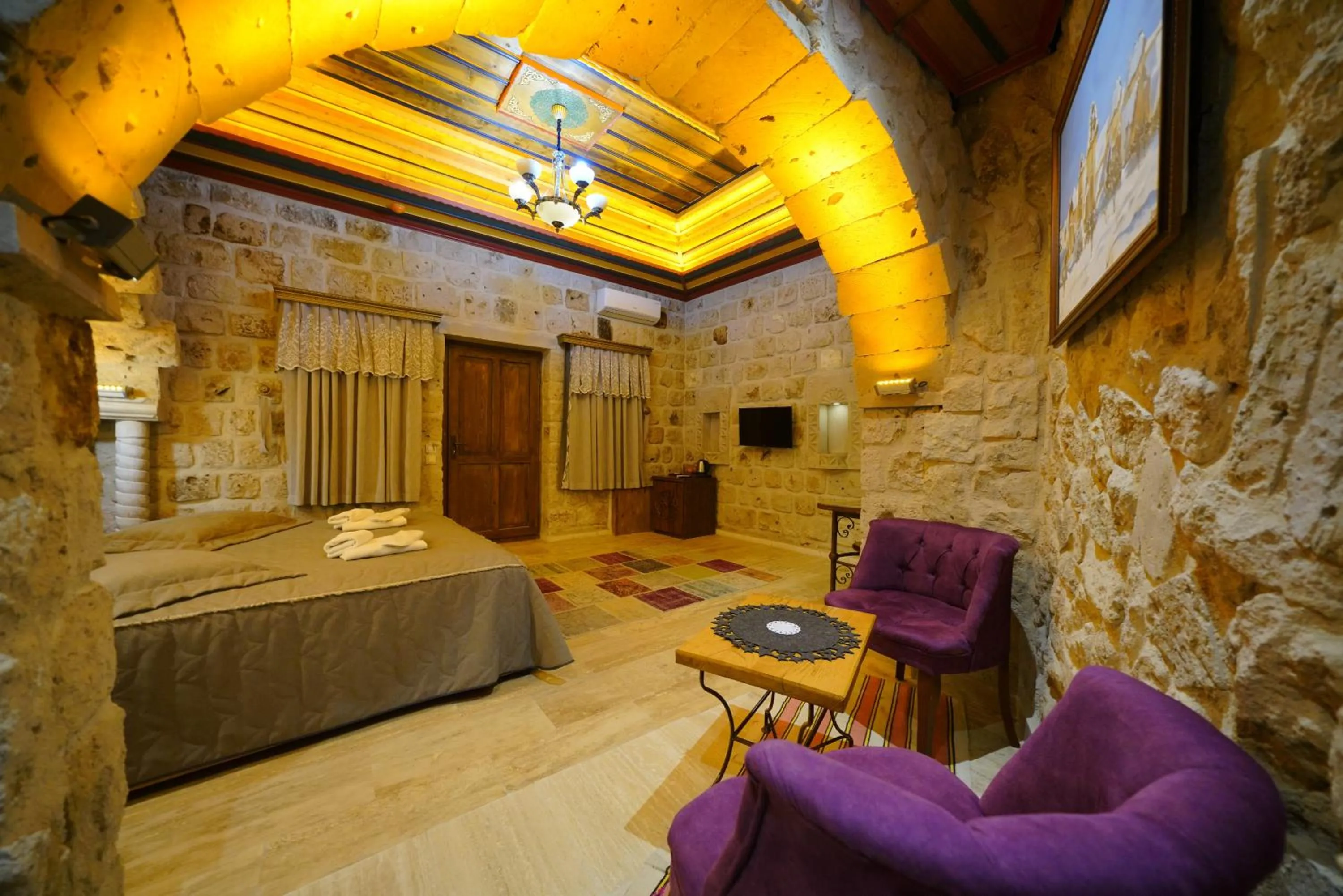 Bed in Göreme Cave Lodge