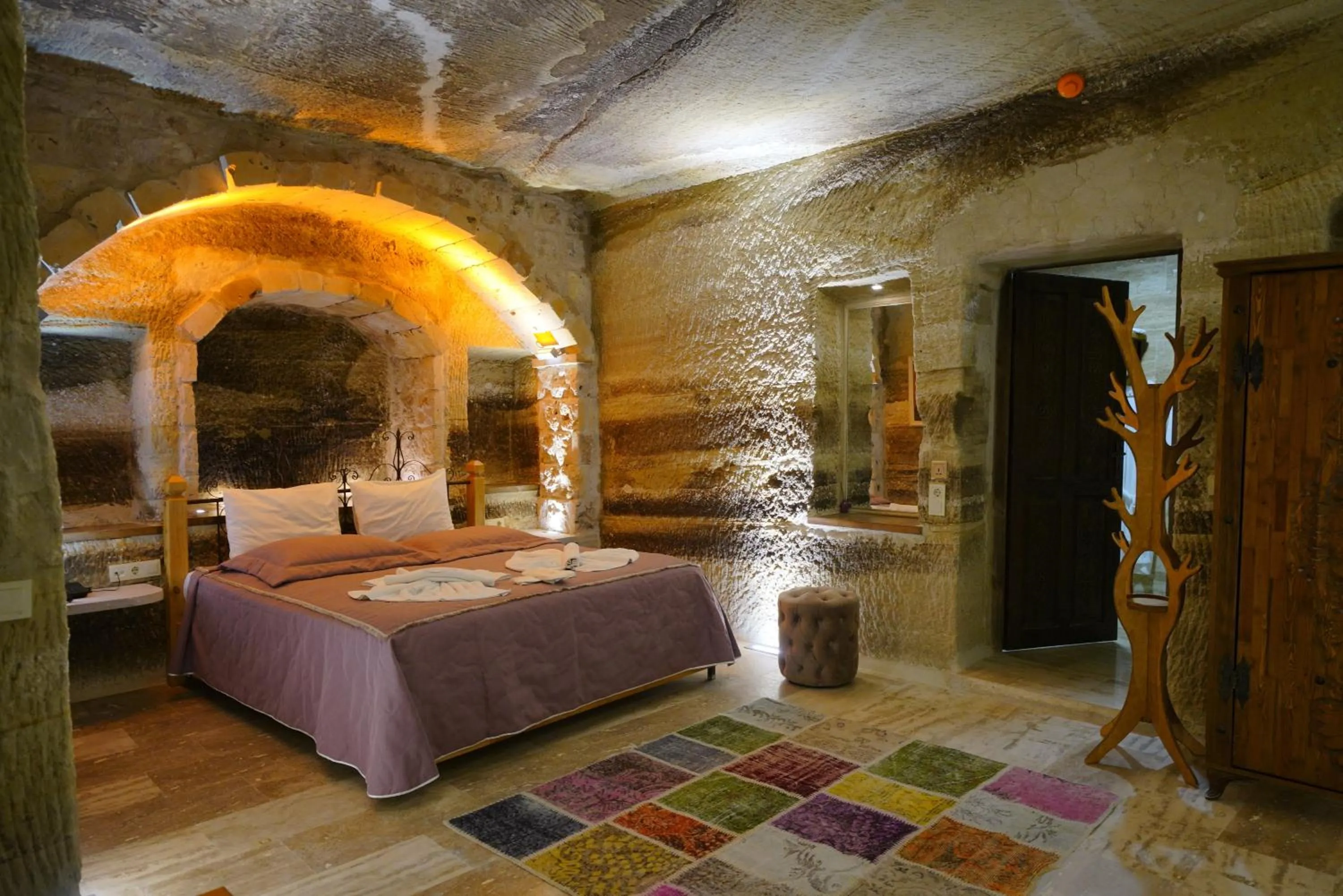 Bed in Göreme Cave Lodge