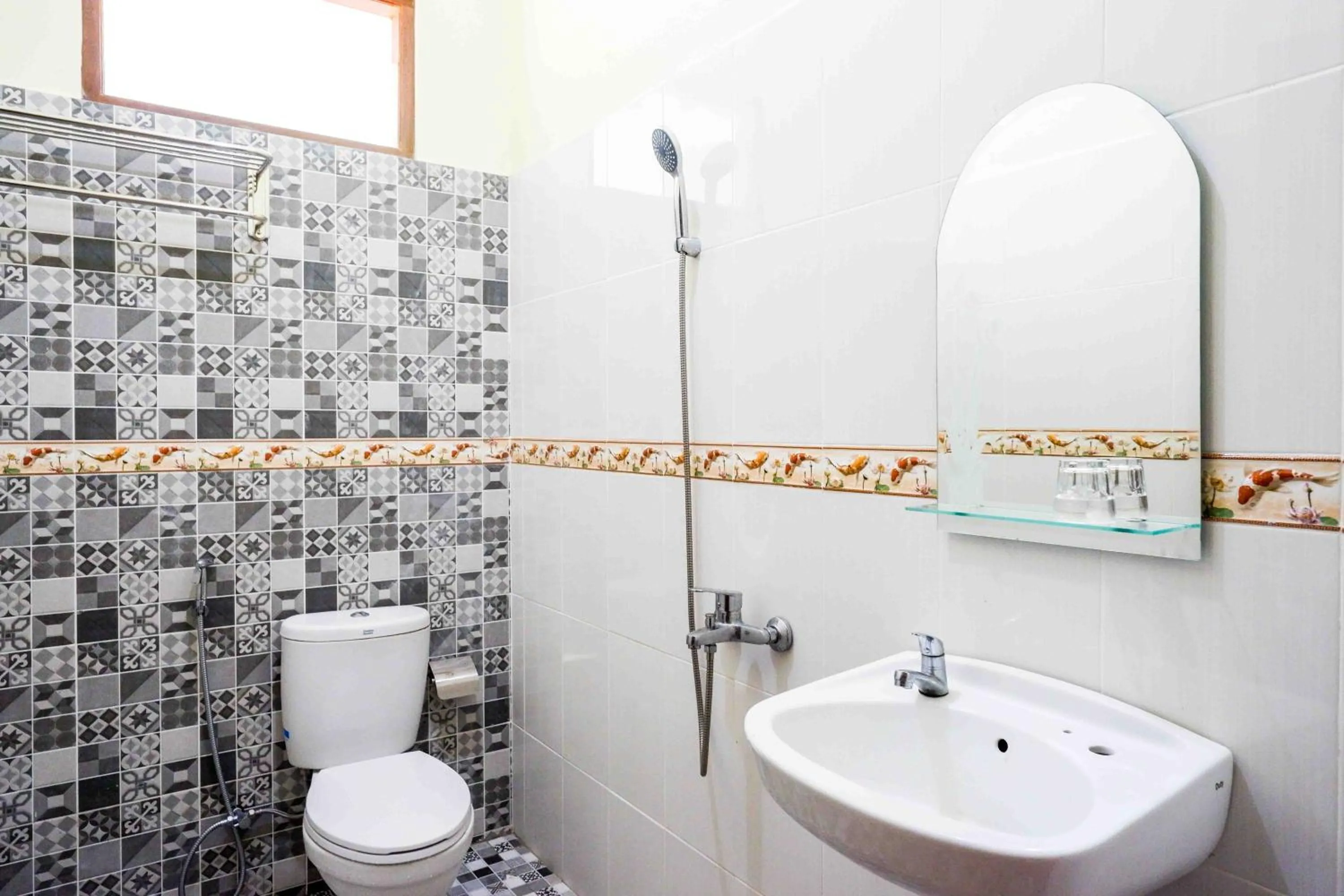 Bathroom in Roemah Beong Syariah at Desa Wisata Kembanglimus Mitra RedDoorz