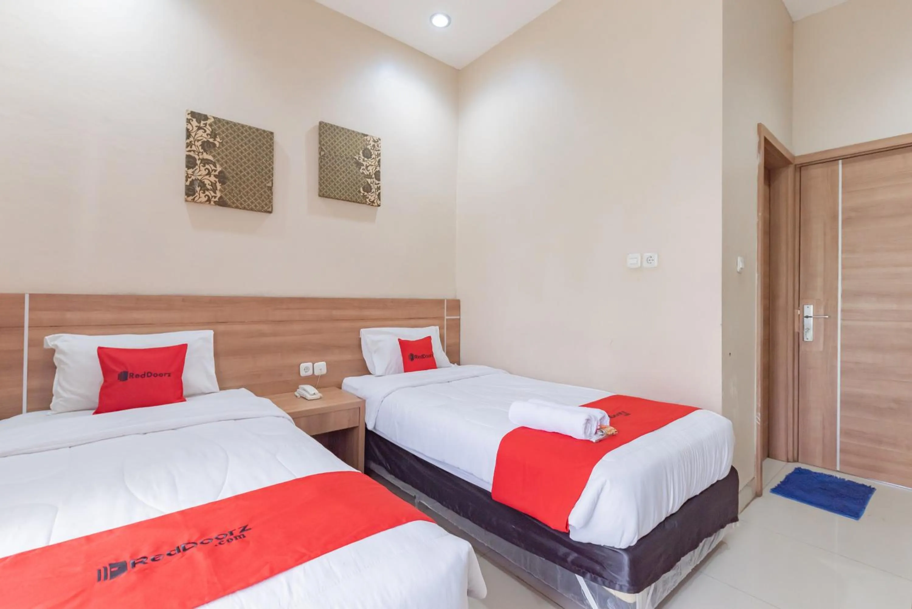 Bedroom, Bed in RedDoorz Premium @ Griya Inkoppabri Cisarua Puncak