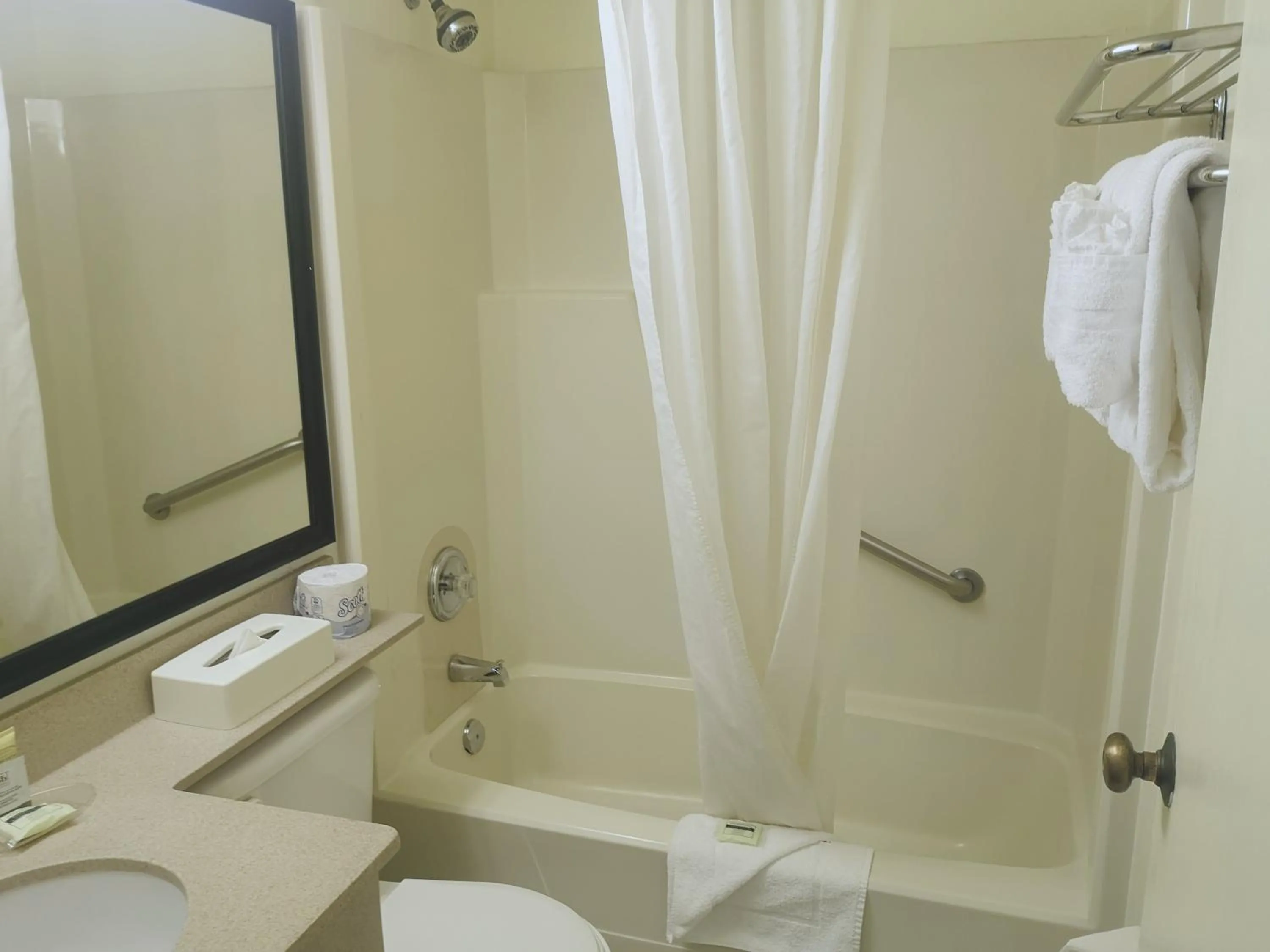 Bathroom in Travelodge by Wyndham Edmonton West