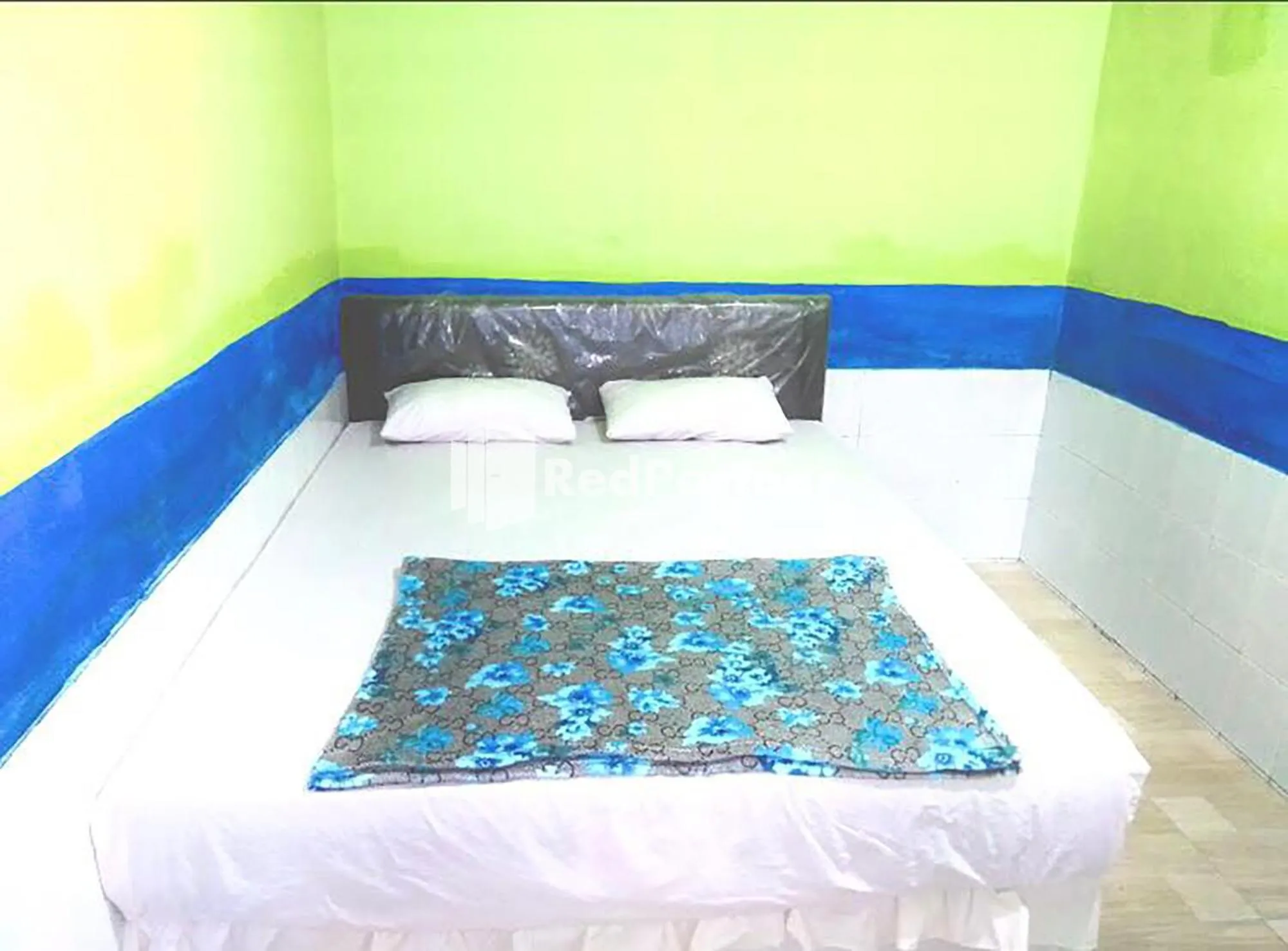 Bedroom, Bed in Hotel Indah Grogot Syariah Mitra RedDoorz