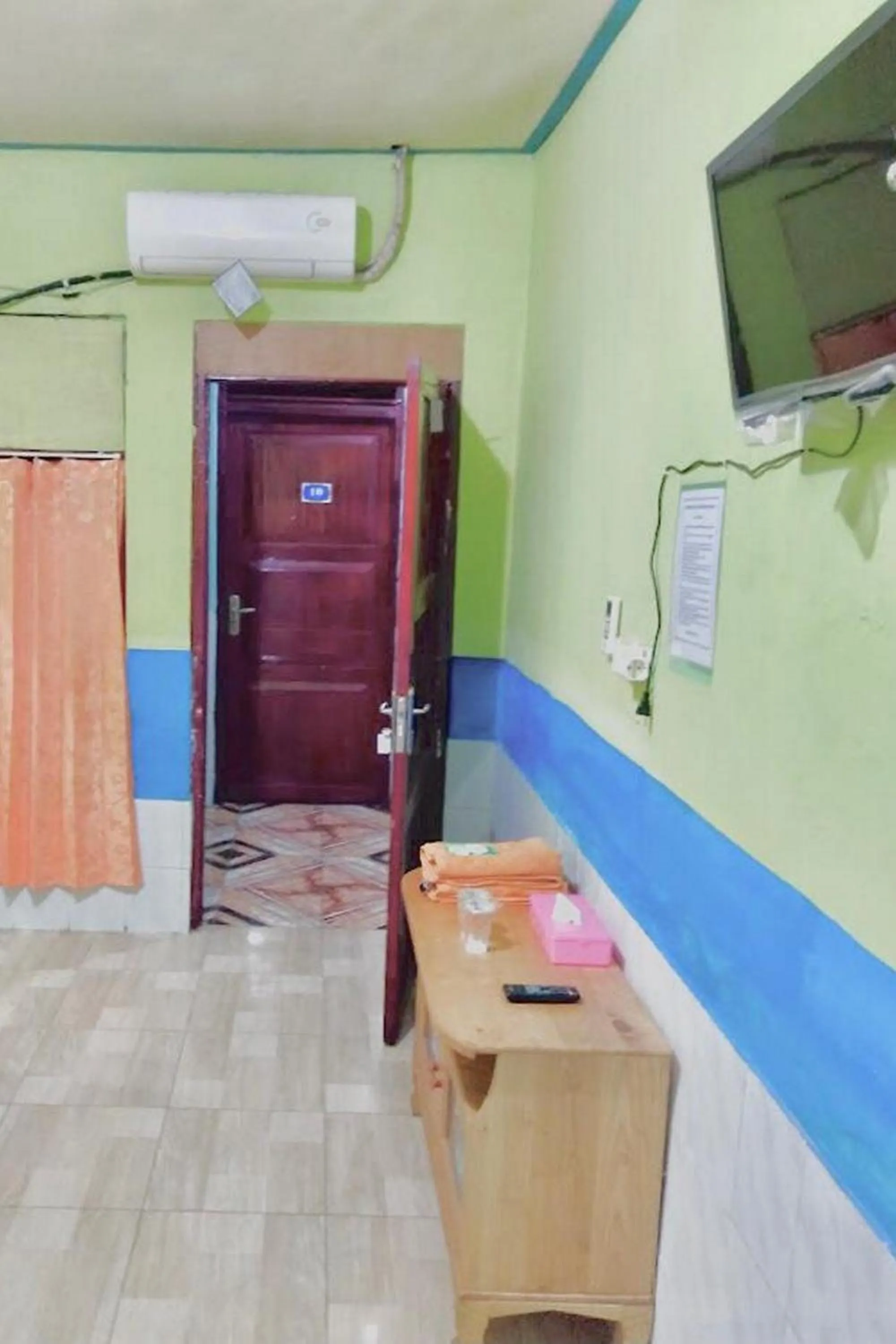 Bedroom in Hotel Indah Grogot Syariah Mitra RedDoorz