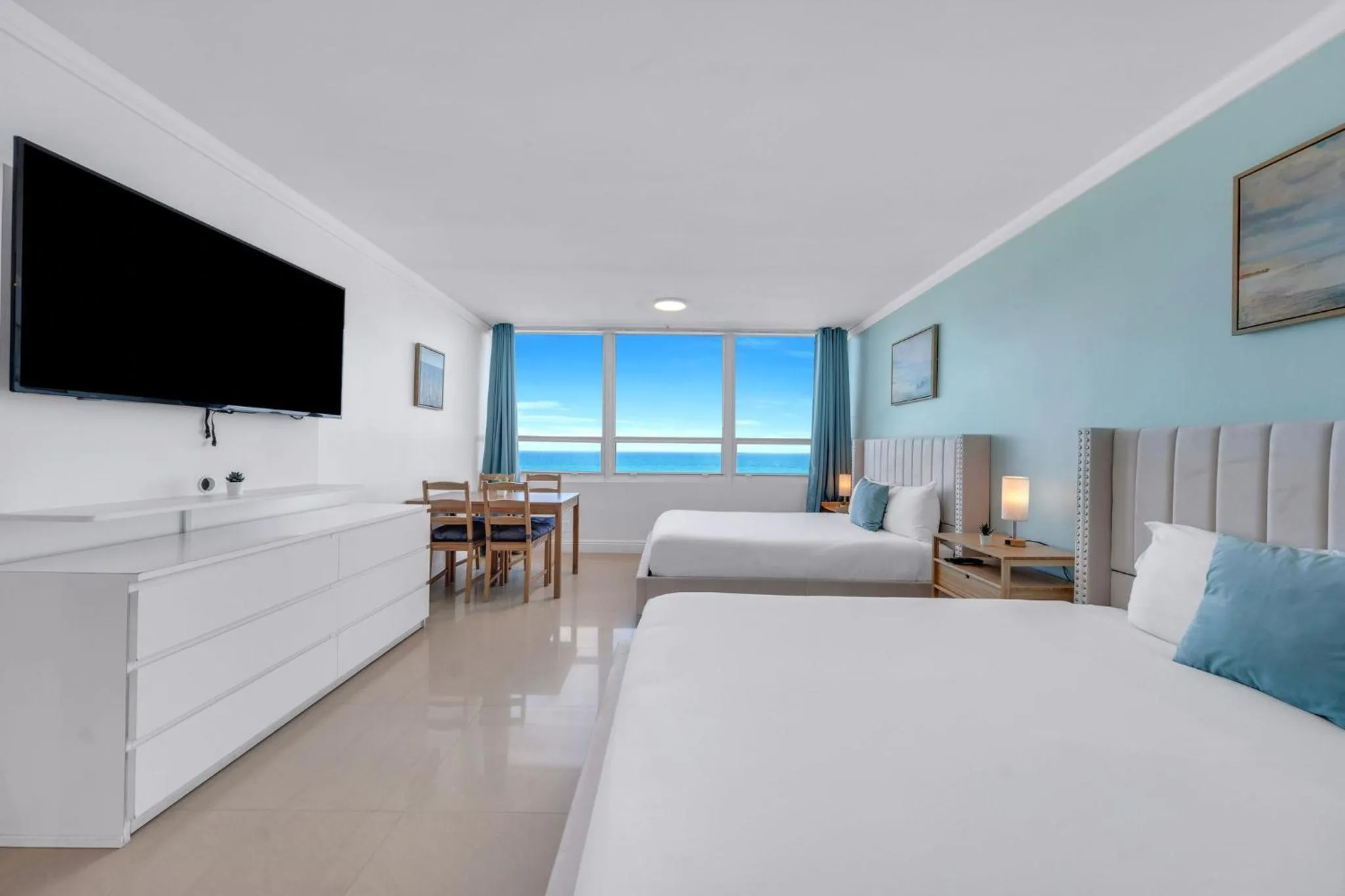 Bed in SeaStays Apartments