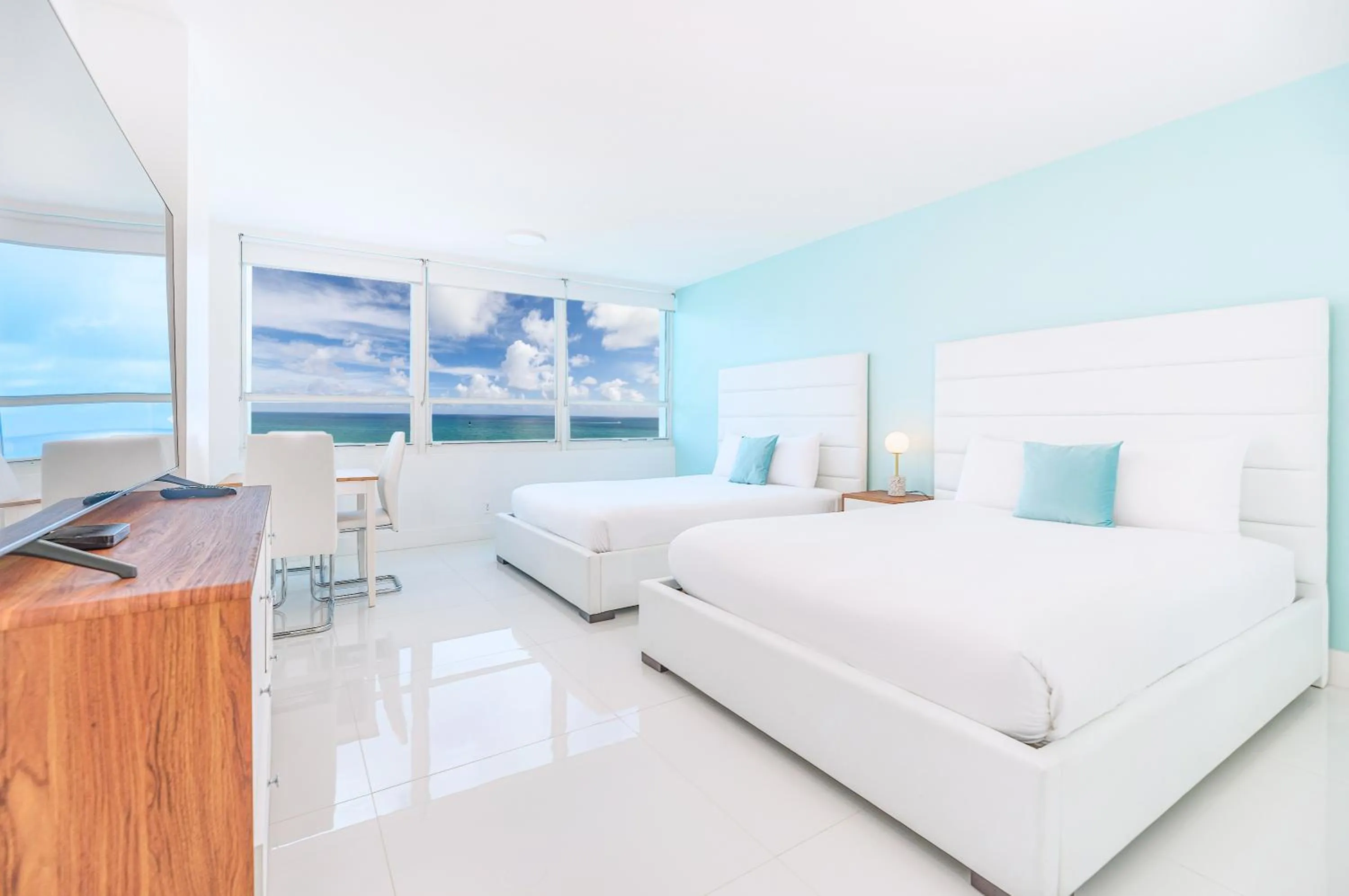 Bed in SeaStays Apartments