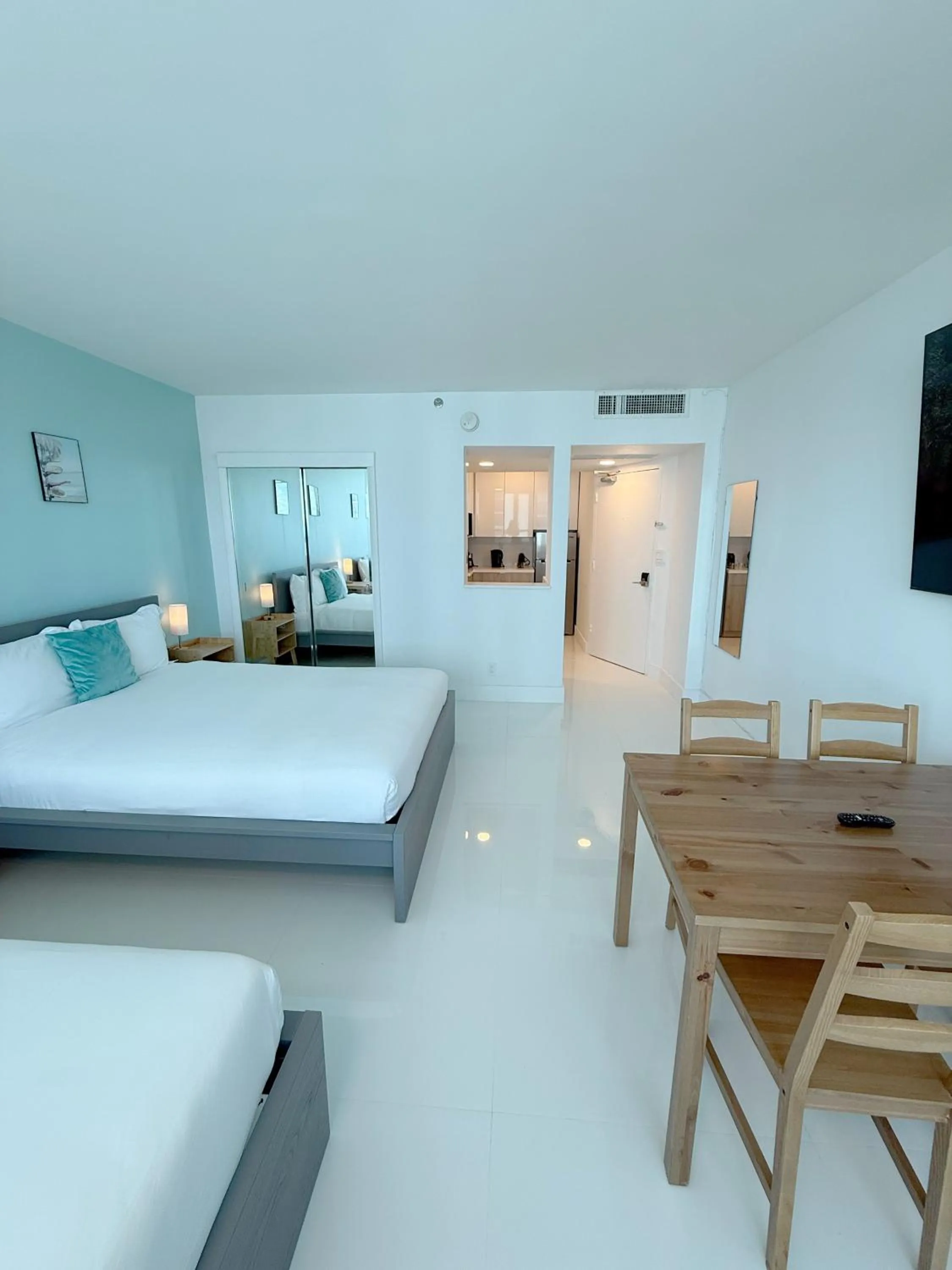 Bed in SeaStays Apartments