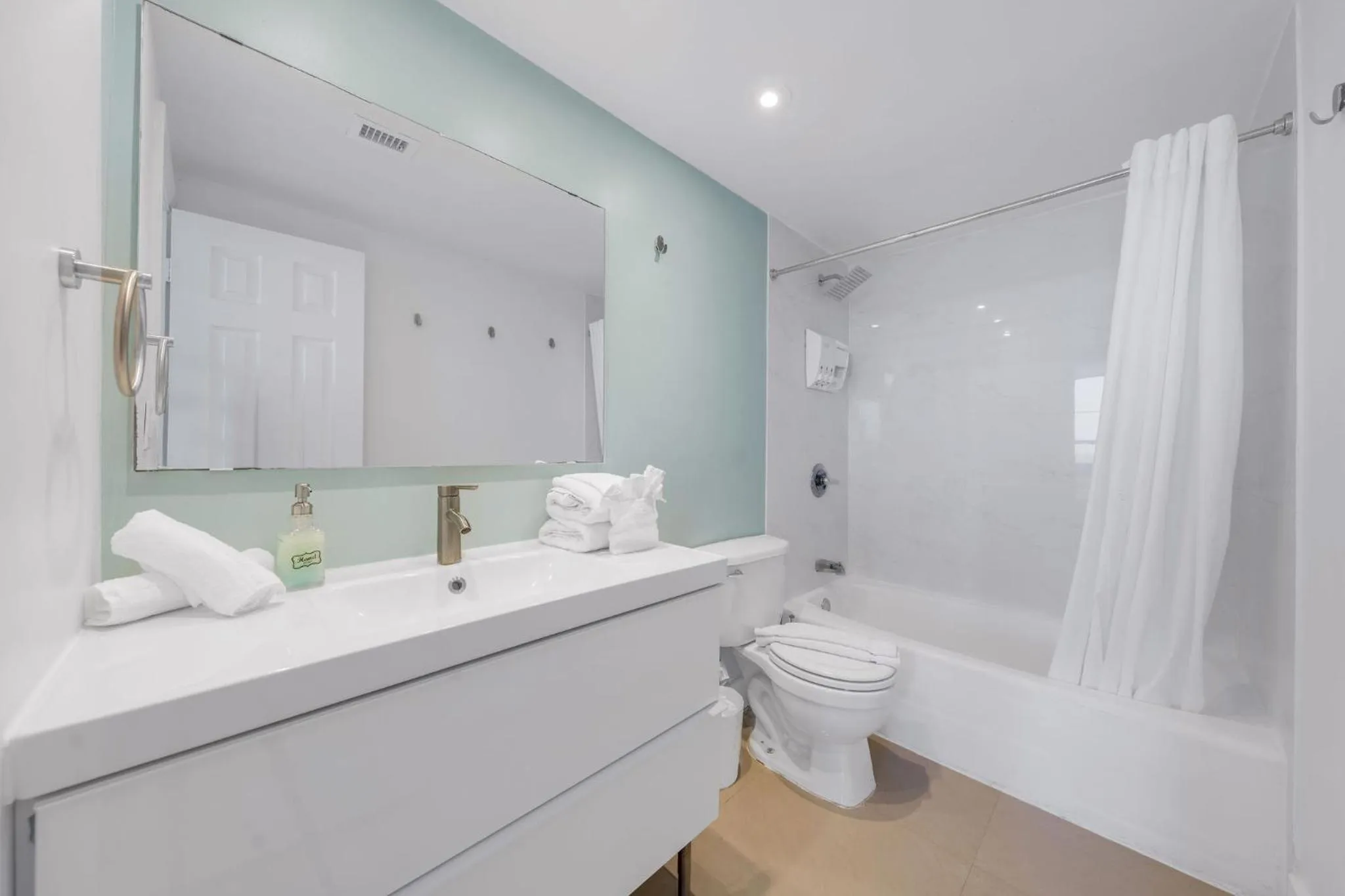 Shower in SeaStays Apartments