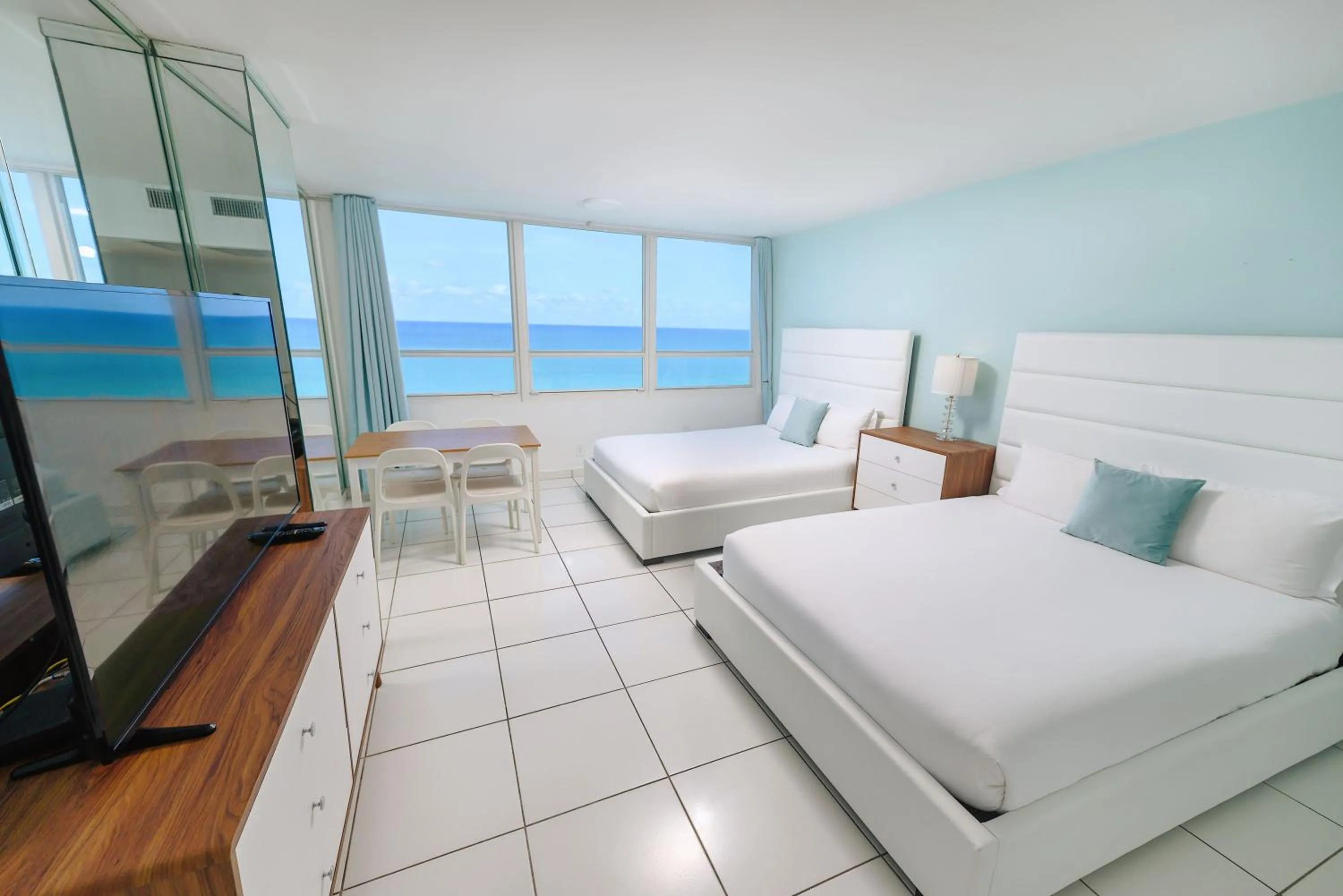 Bed in SeaStays Apartments