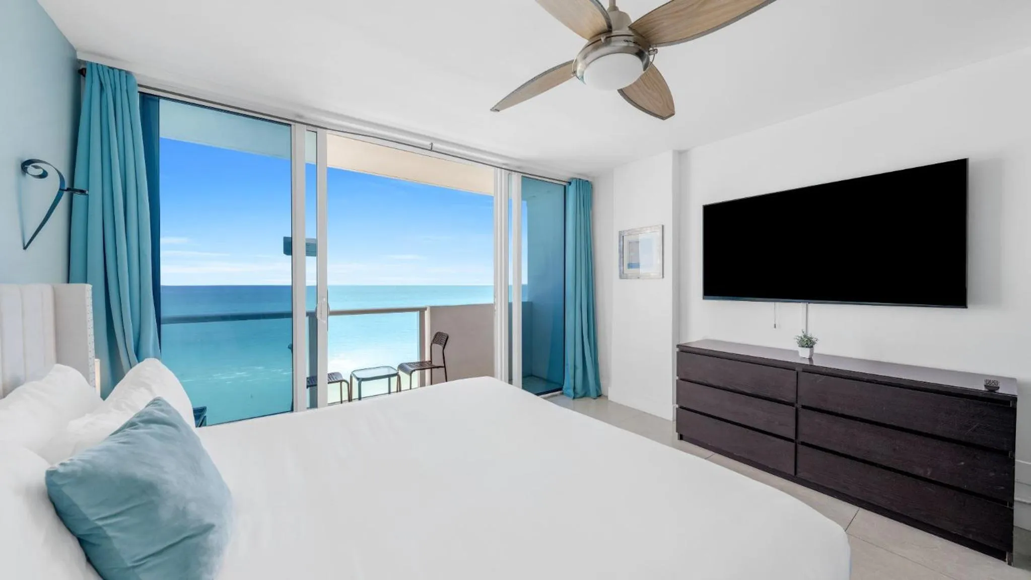 Bed in SeaStays Apartments