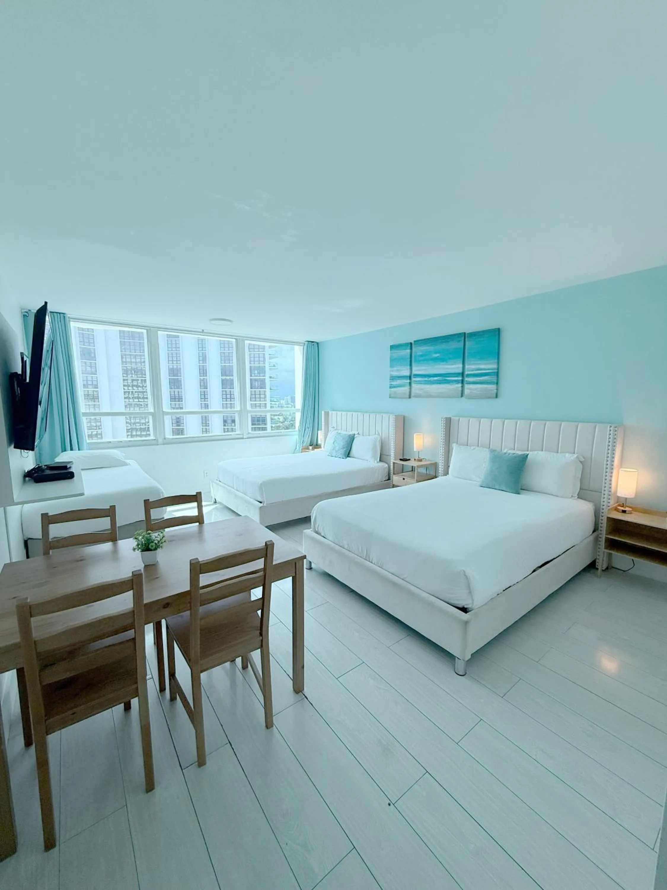 Bed in SeaStays Apartments