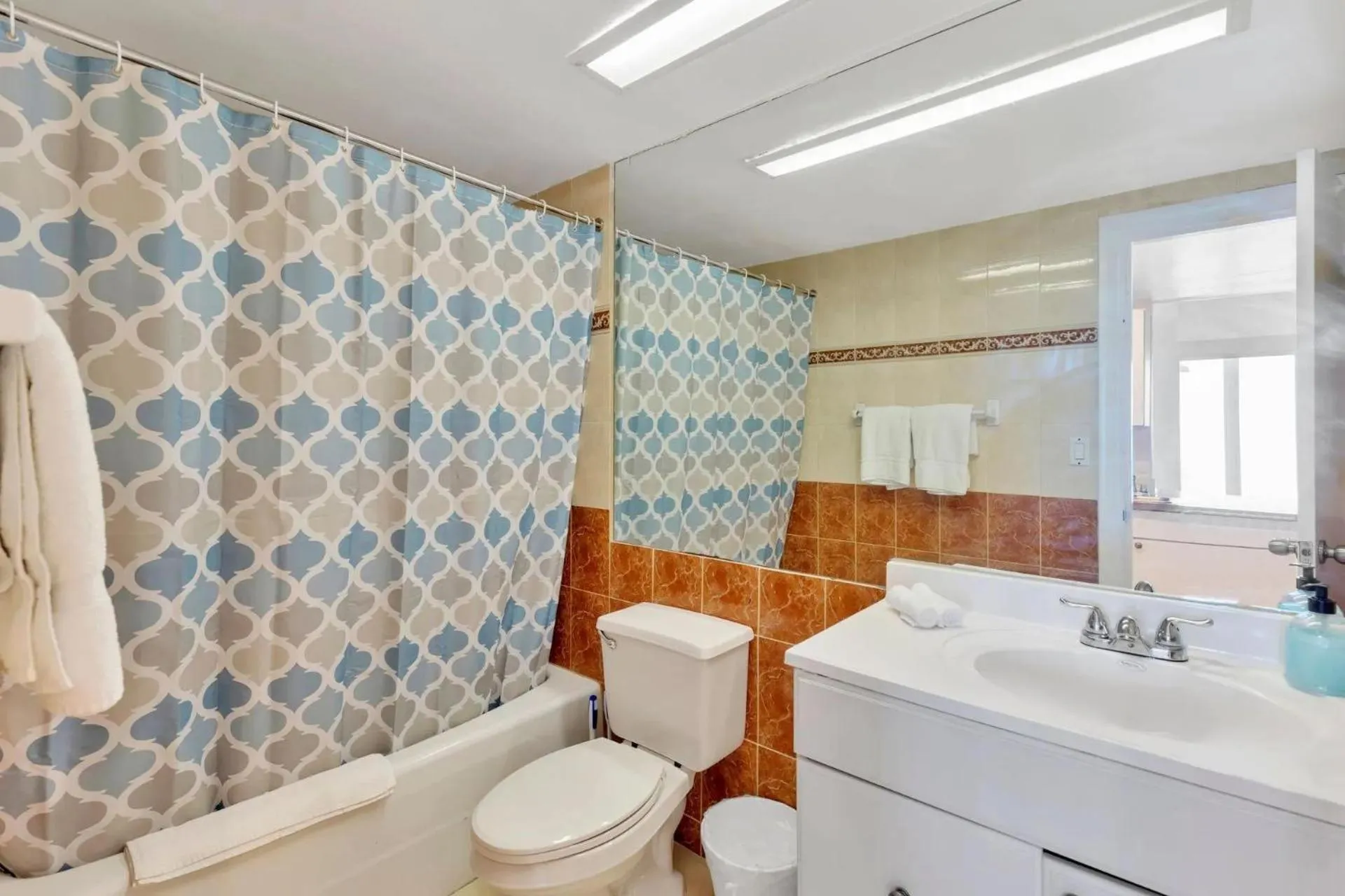 Shower in SeaStays Apartments