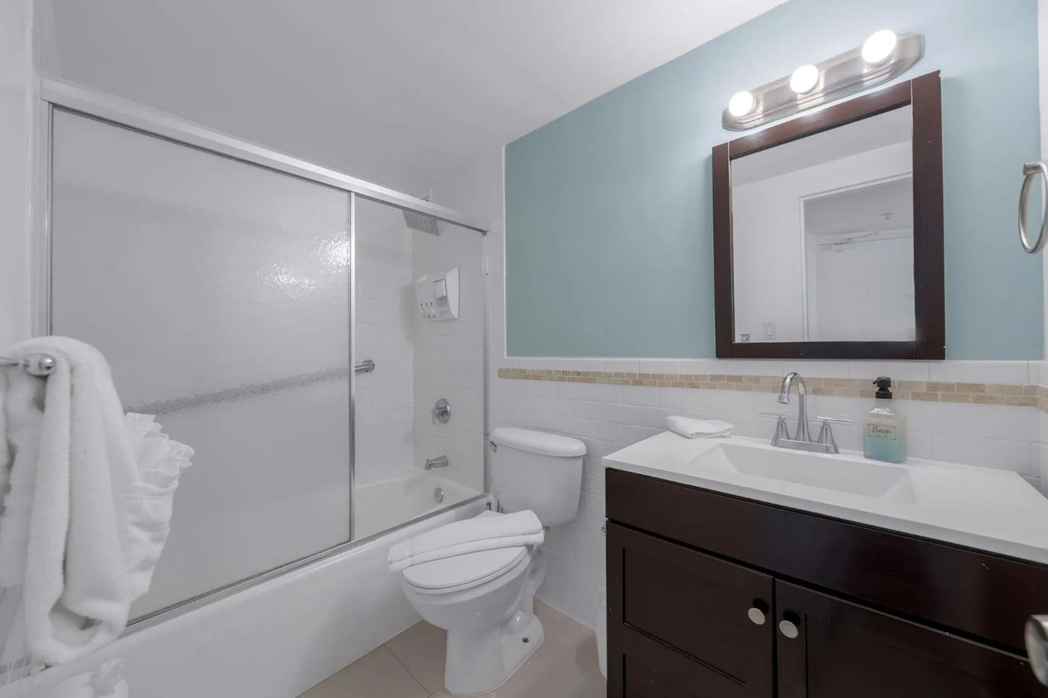 Shower in SeaStays Apartments